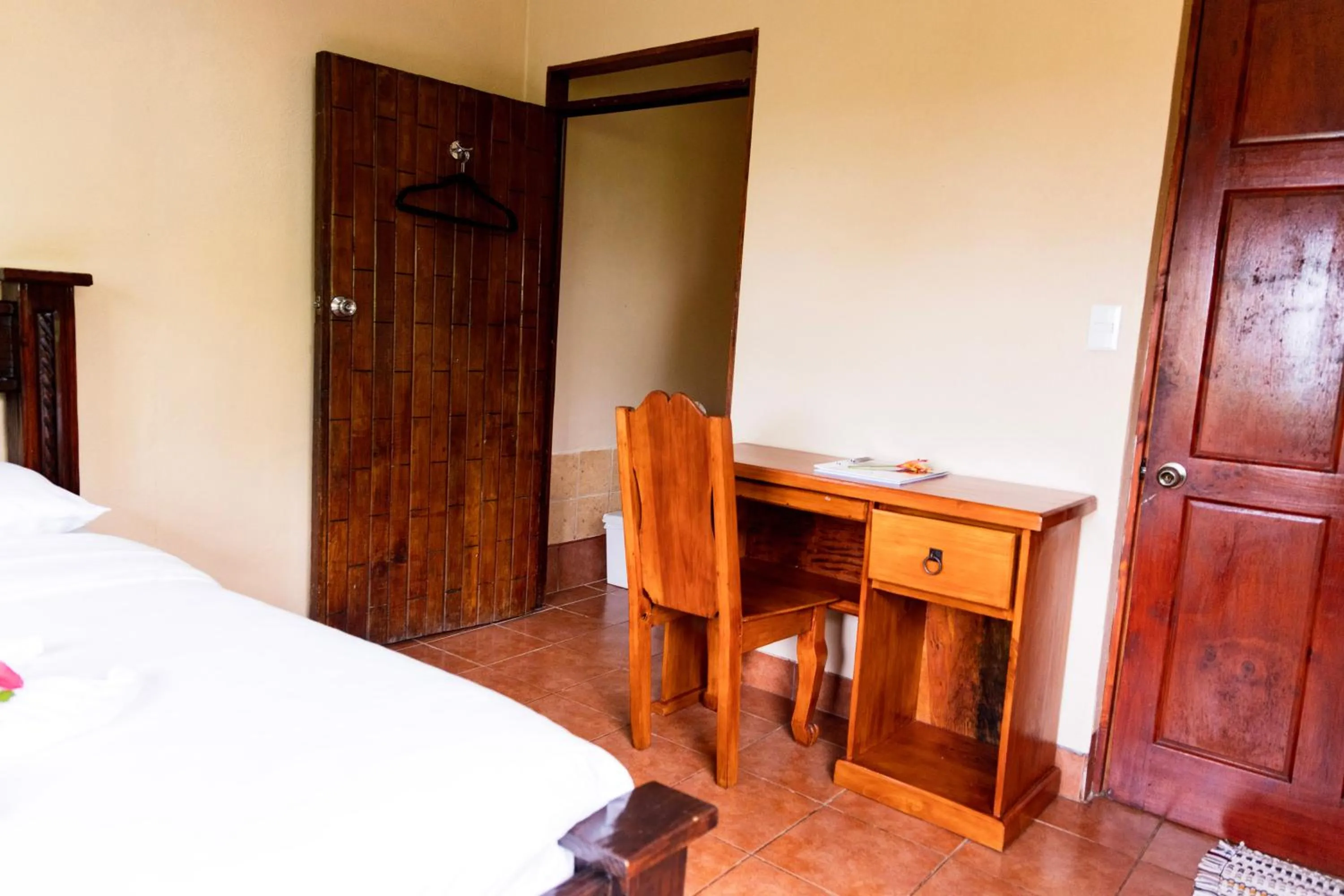 Seating area, Bed in Essence Arenal Spa & Yoga