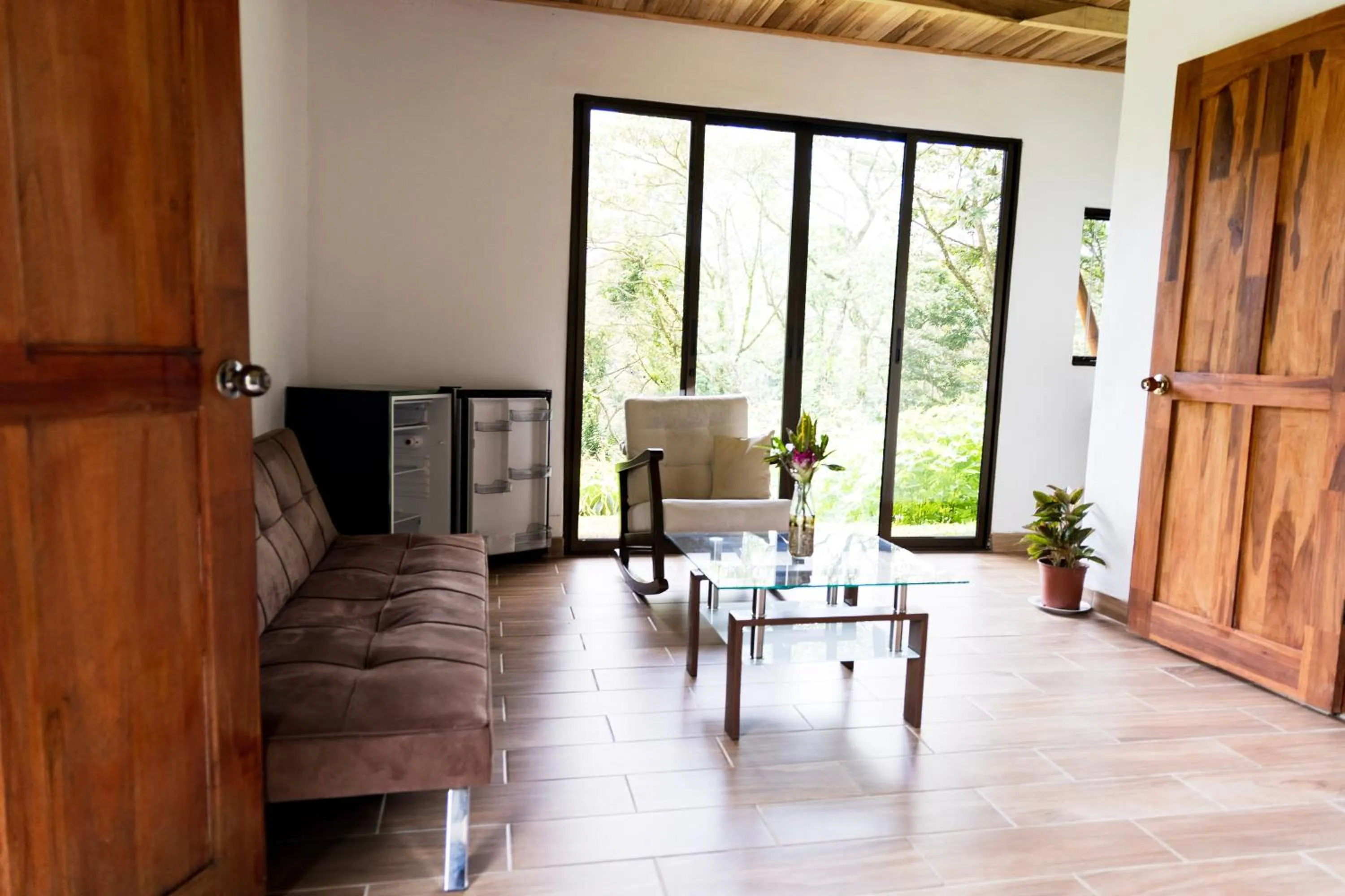 Living room in Essence Arenal Spa & Yoga
