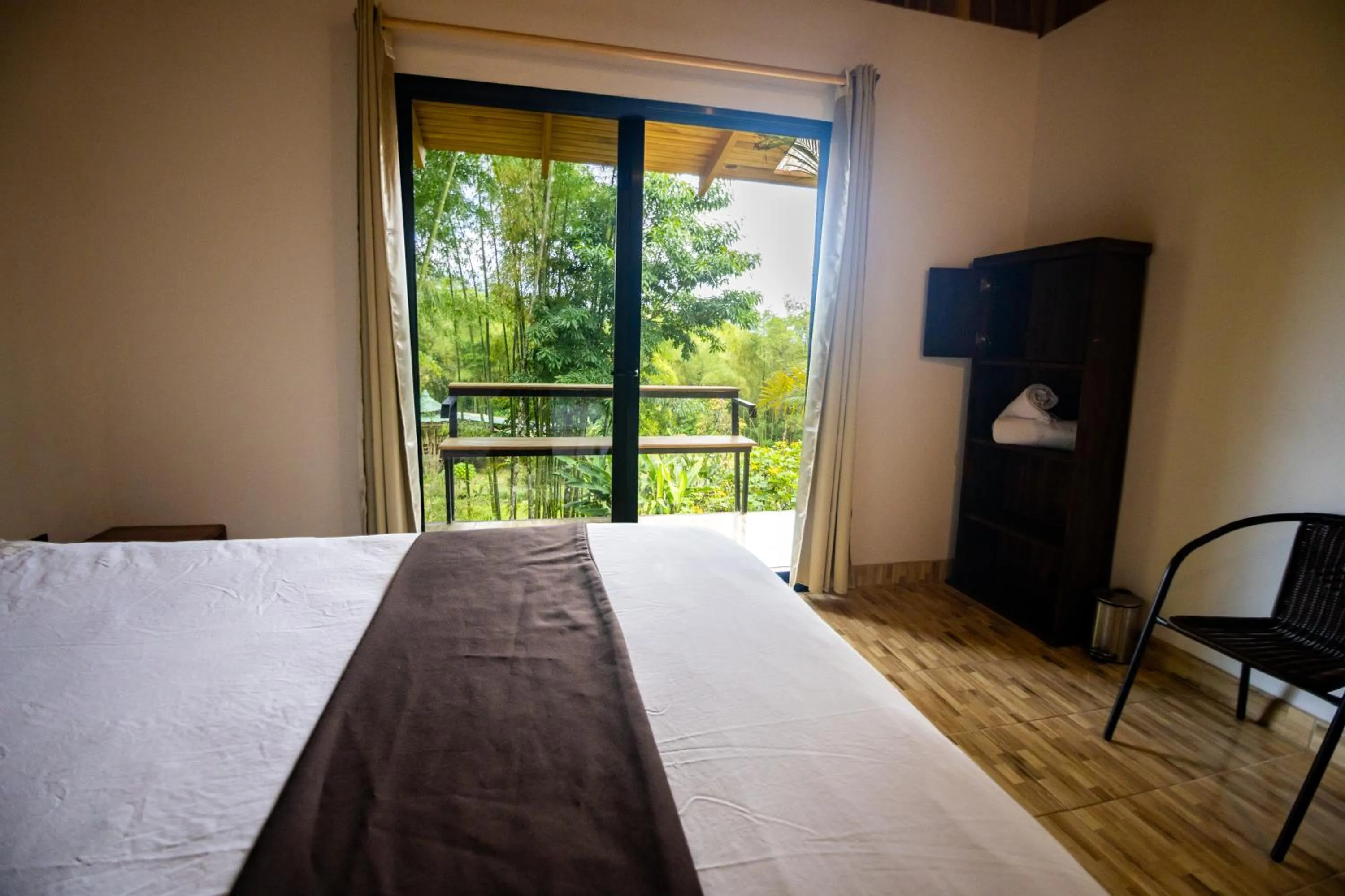 Bed in Essence Arenal Spa & Yoga