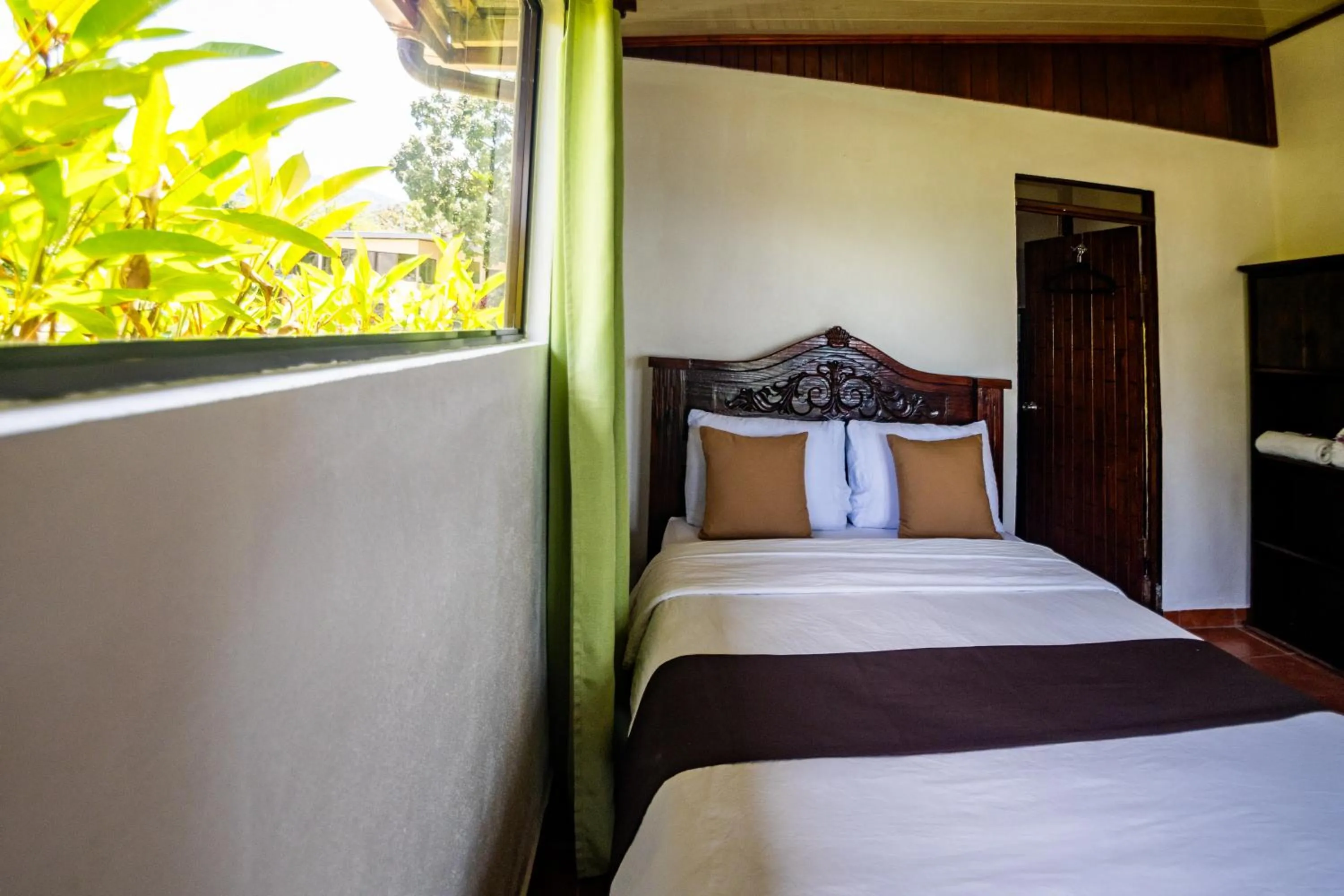 Bed in Essence Arenal Spa & Yoga