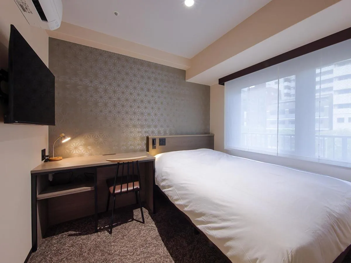 Bed in Hotel SUI Kobe Sannomiya by ABEST