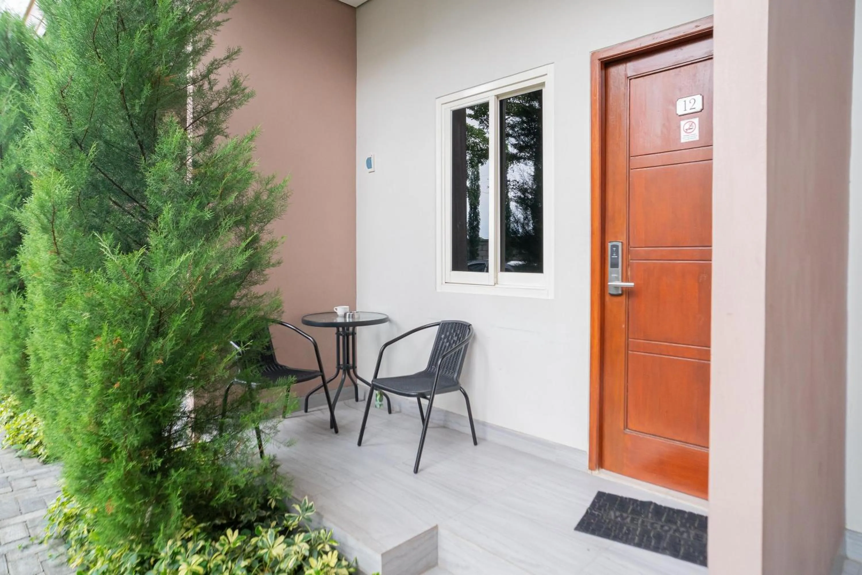 Balcony/Terrace in Urbanview Hotel Bubusini Batu by RedDoorz