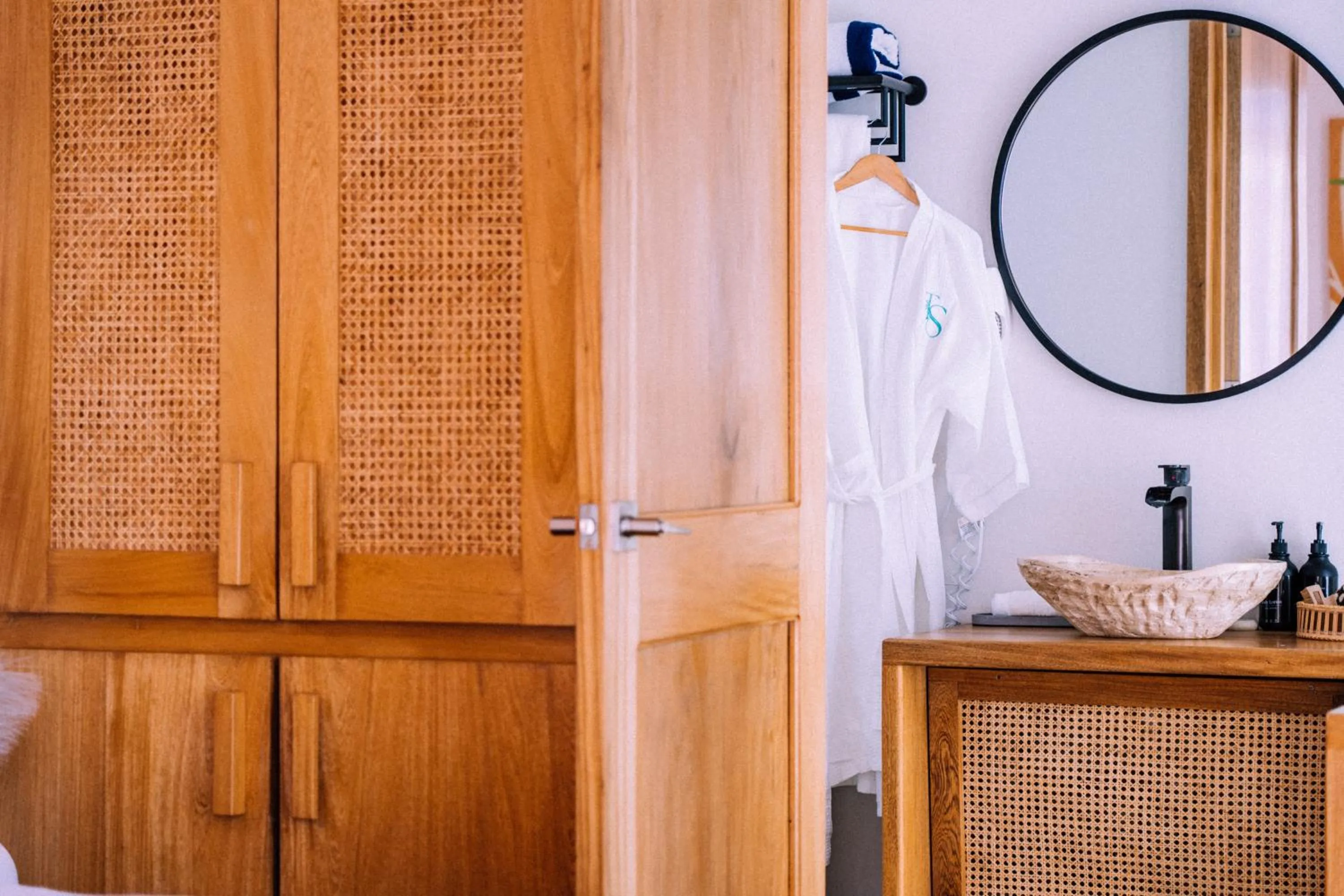 Bathroom in Tropical Suites Hotel