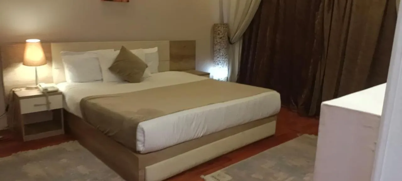 Bed in Jewel Maadi Cabins and Club