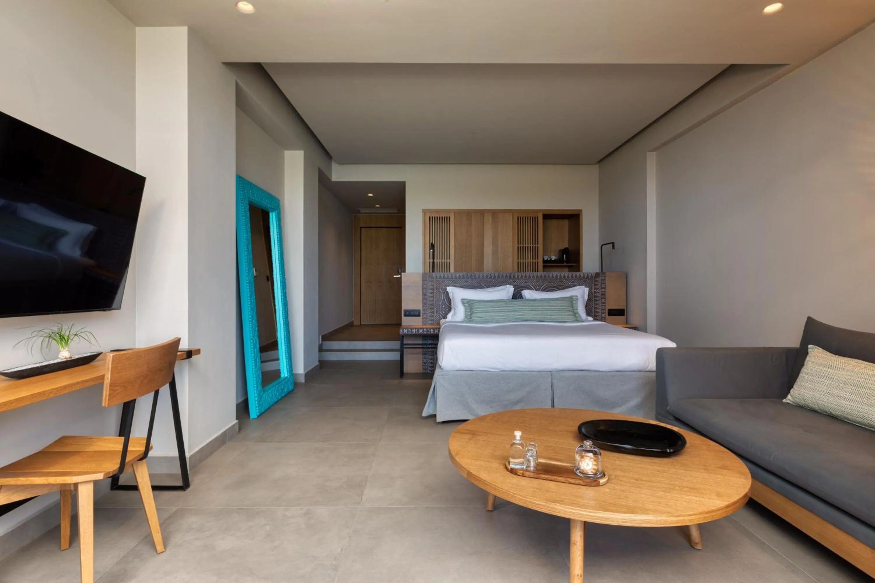 Communal lounge/ TV room, Bed in Castello Infinity Suites - Adults Only