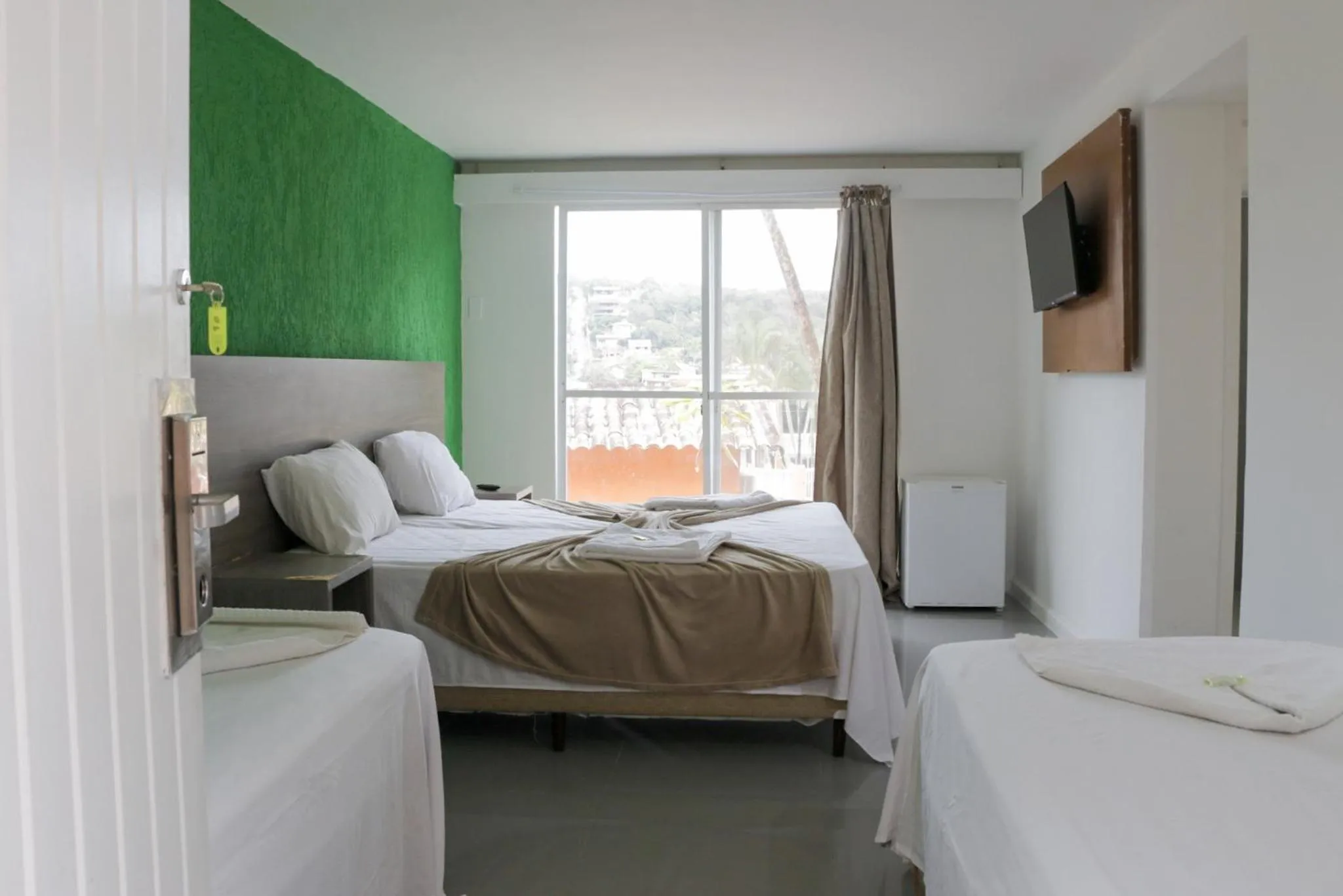 Bed in Tarumã Búzios Hotel