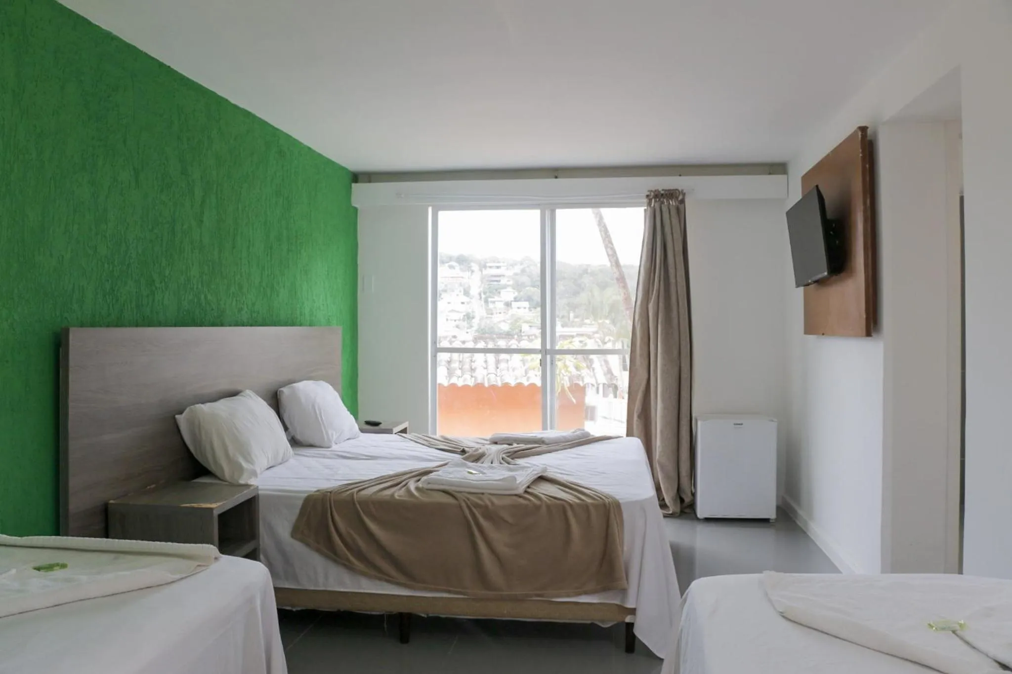 Bed in Tarumã Búzios Hotel