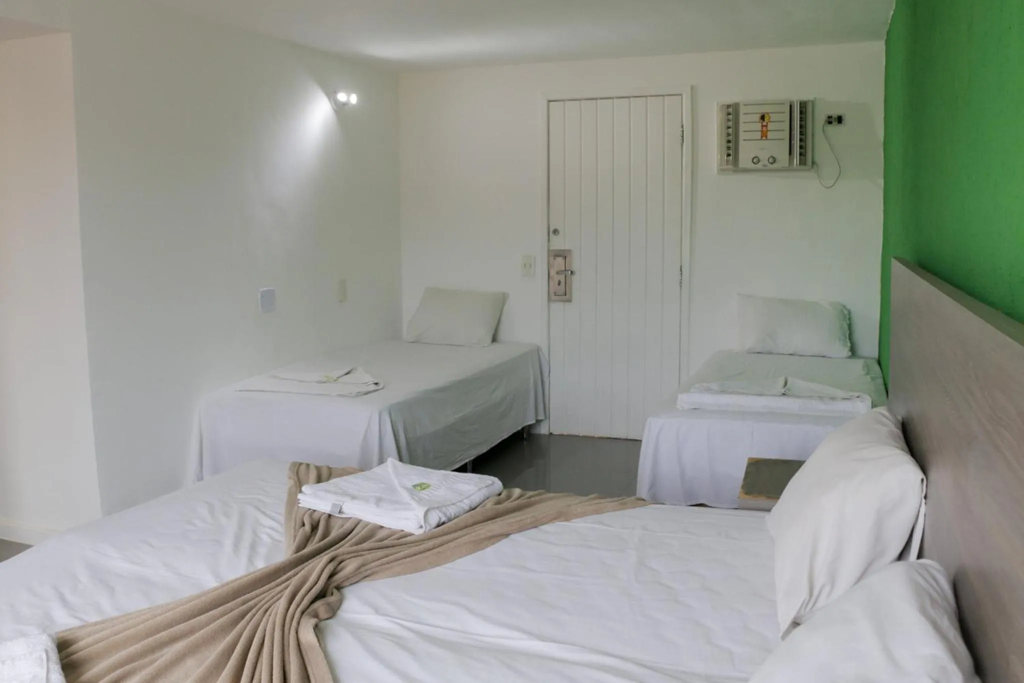 Bed in Tarumã Búzios Hotel