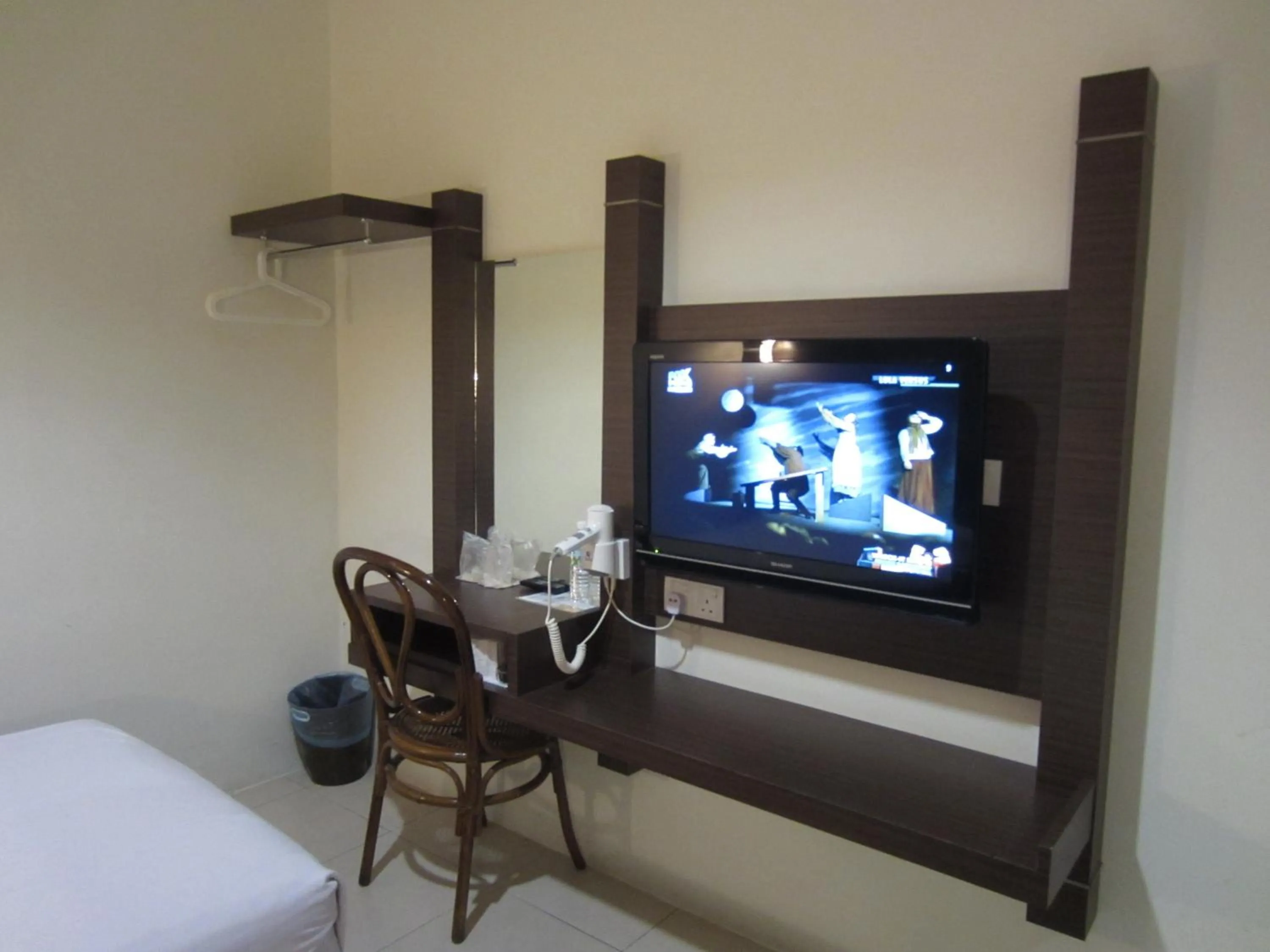 Bed in Radiant Hotel