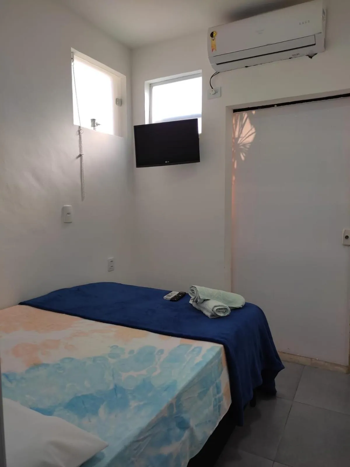 Bed in Pousada Praia do Tombo