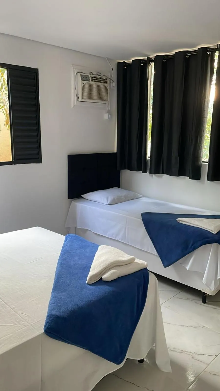 Bed in Pousada Praia do Tombo