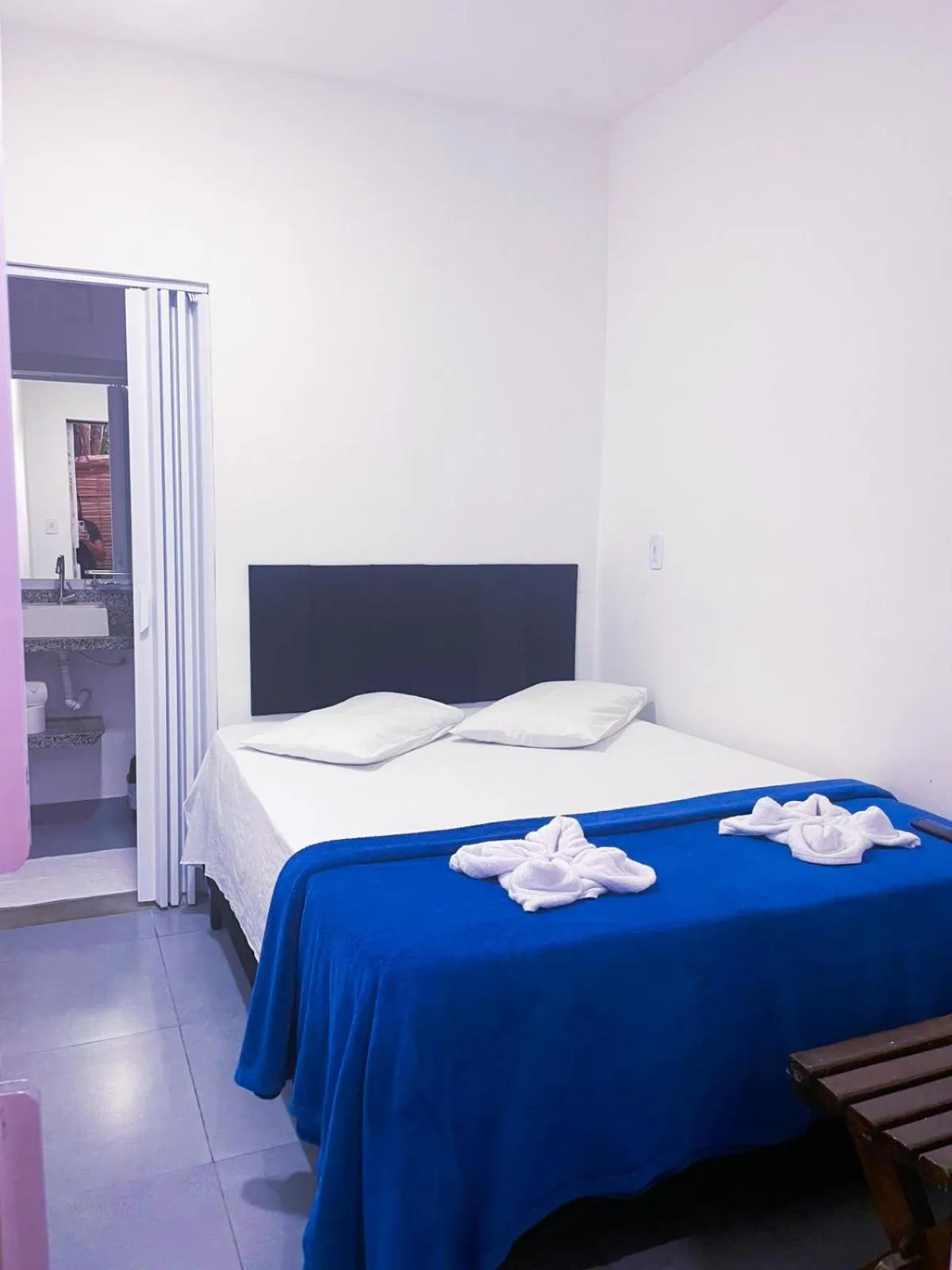 Bed in Pousada Praia do Tombo