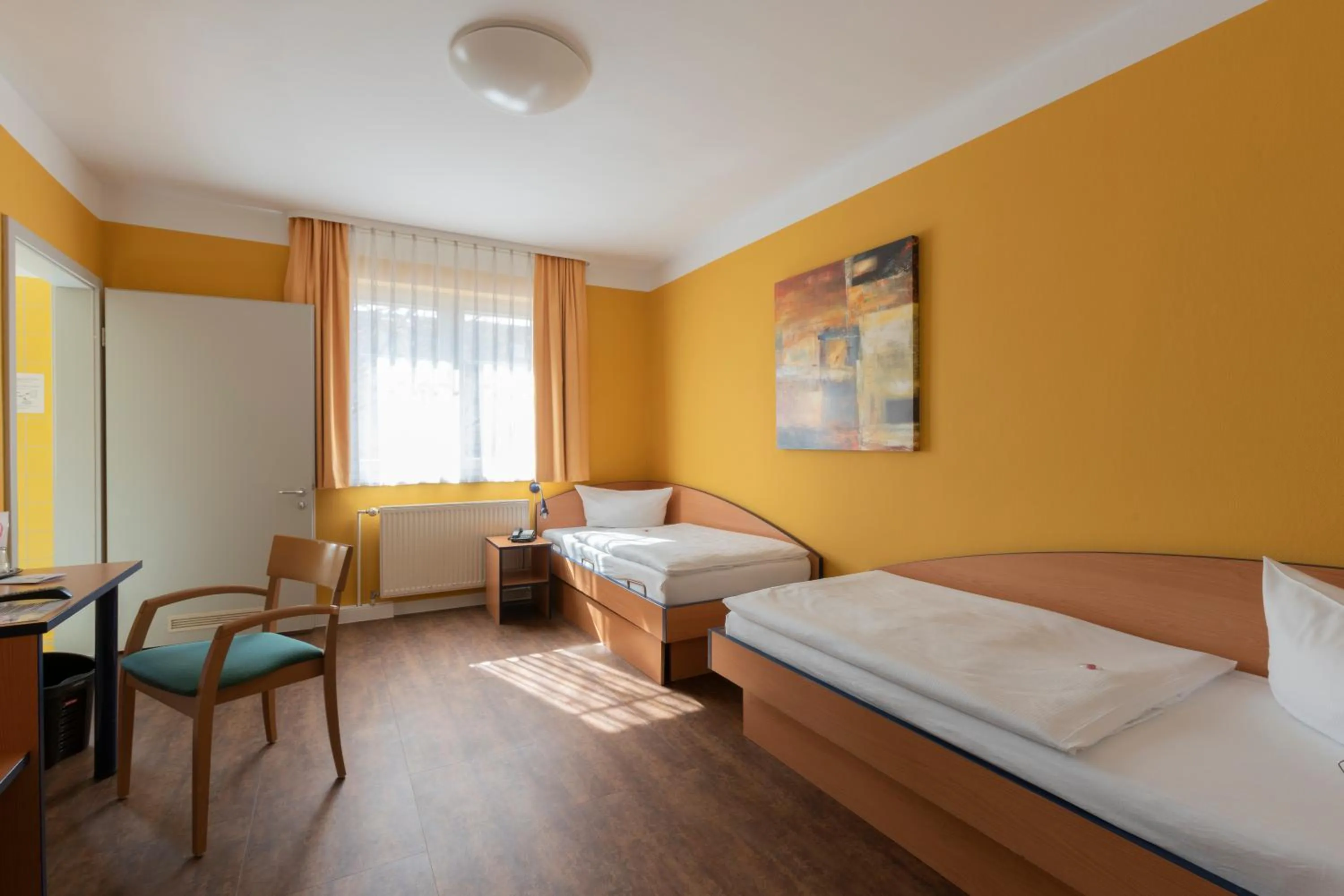 Photo of the whole room, Bed in Hotel Mit-Mensch