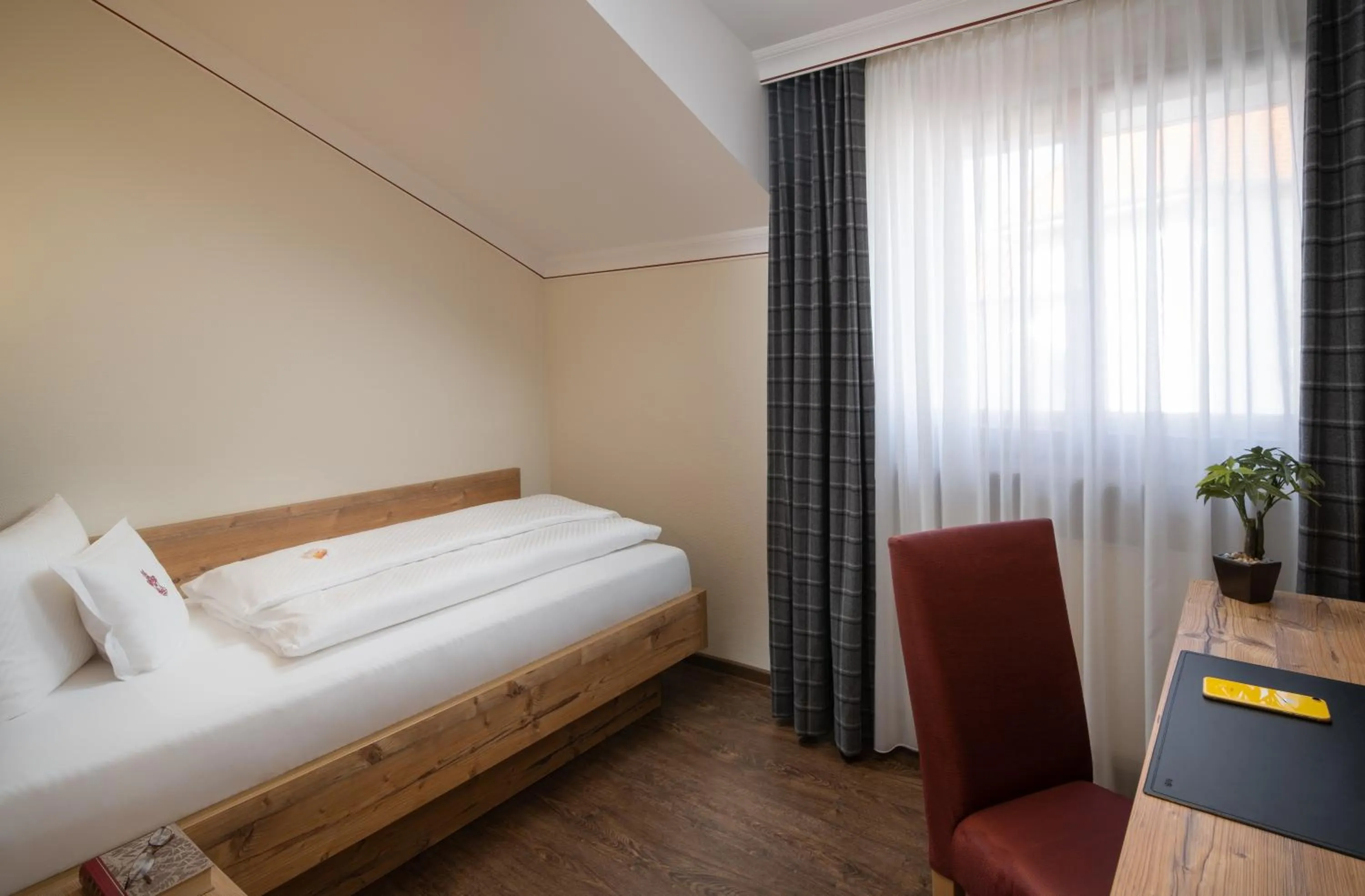 Photo of the whole room, Bed in Ringhotel Winzerhof