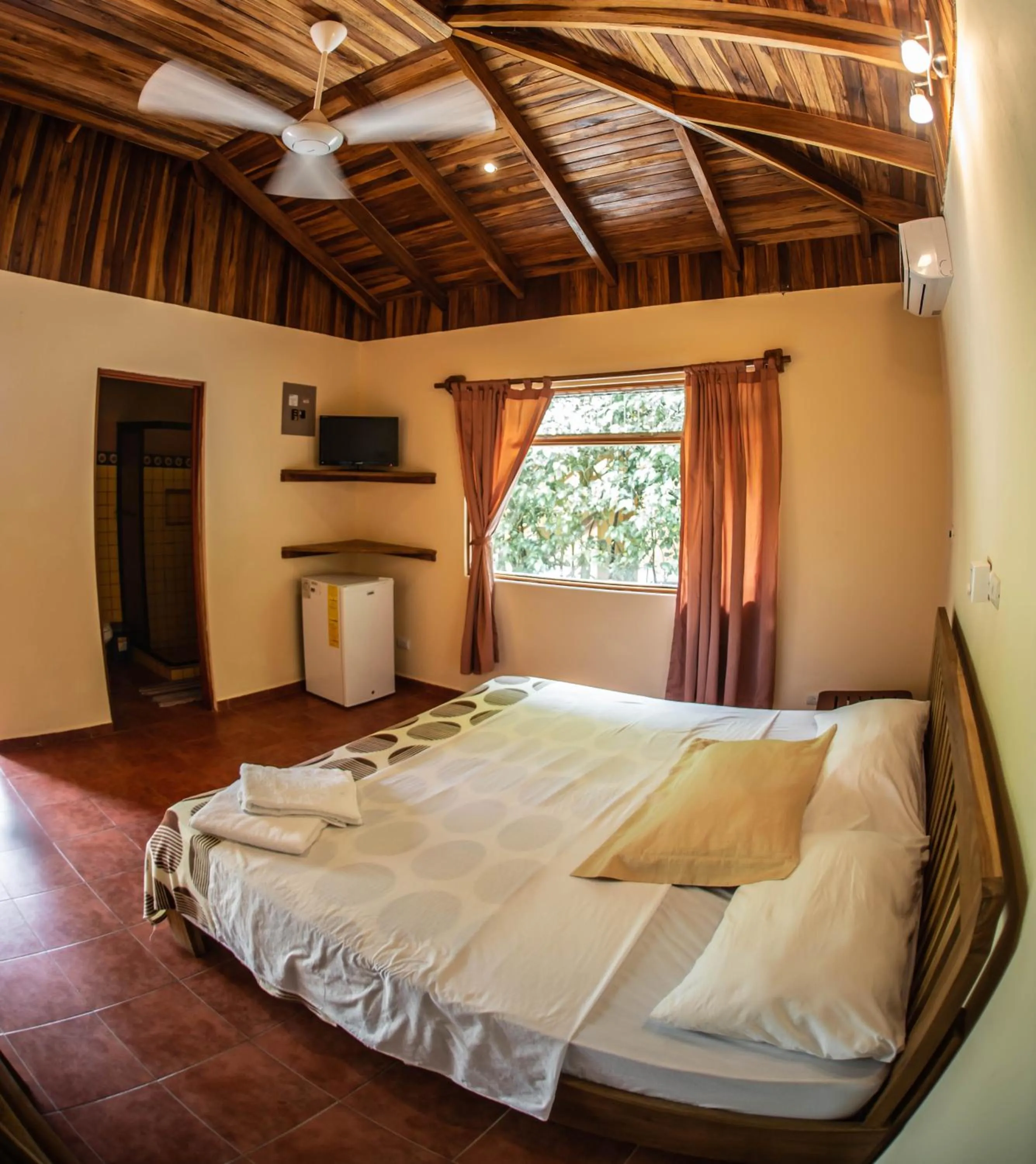 Bed in Hotel Ritmo Tropical - Pool and Breakfast