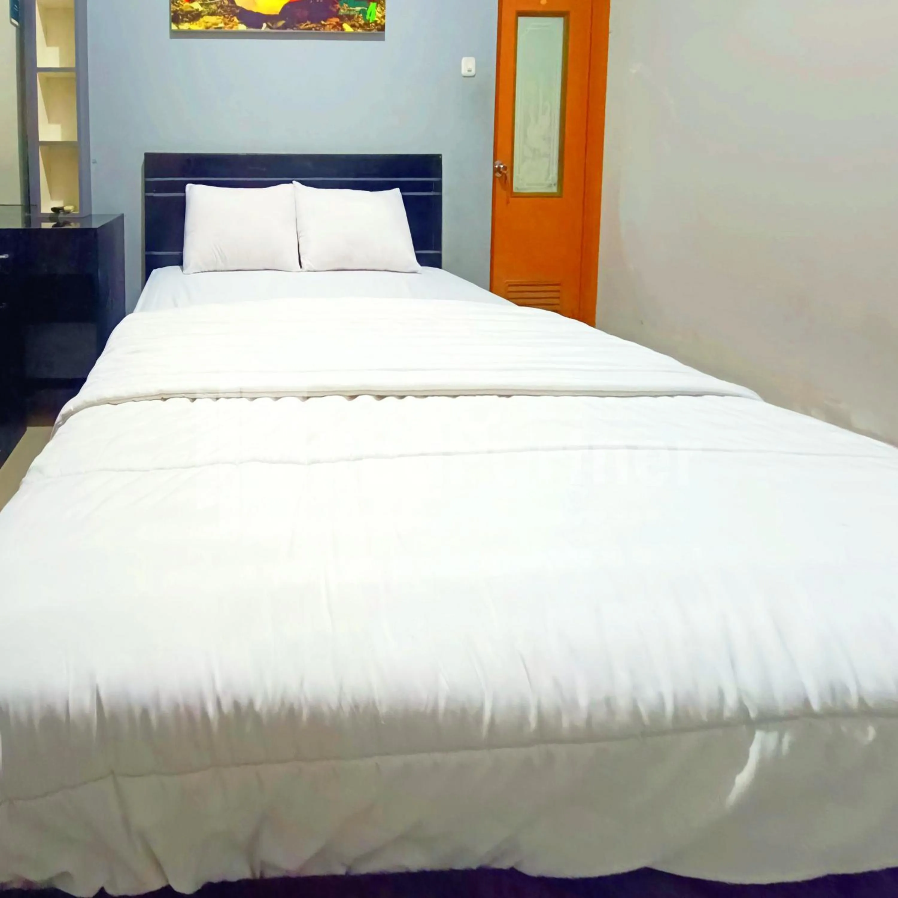 Bedroom, Bed in D'Waru Homestay Syariah near Jl Slamet Riyadi Mitra RedDoorz