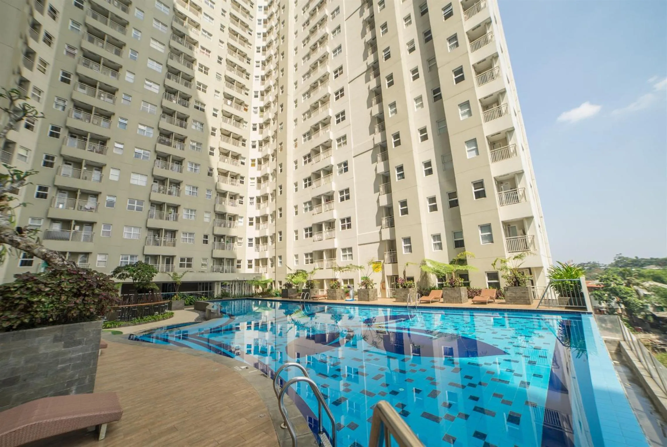 Swimming pool in Spacious 3BR Apartment Parahyangan Residence near UNPAR By Travelio