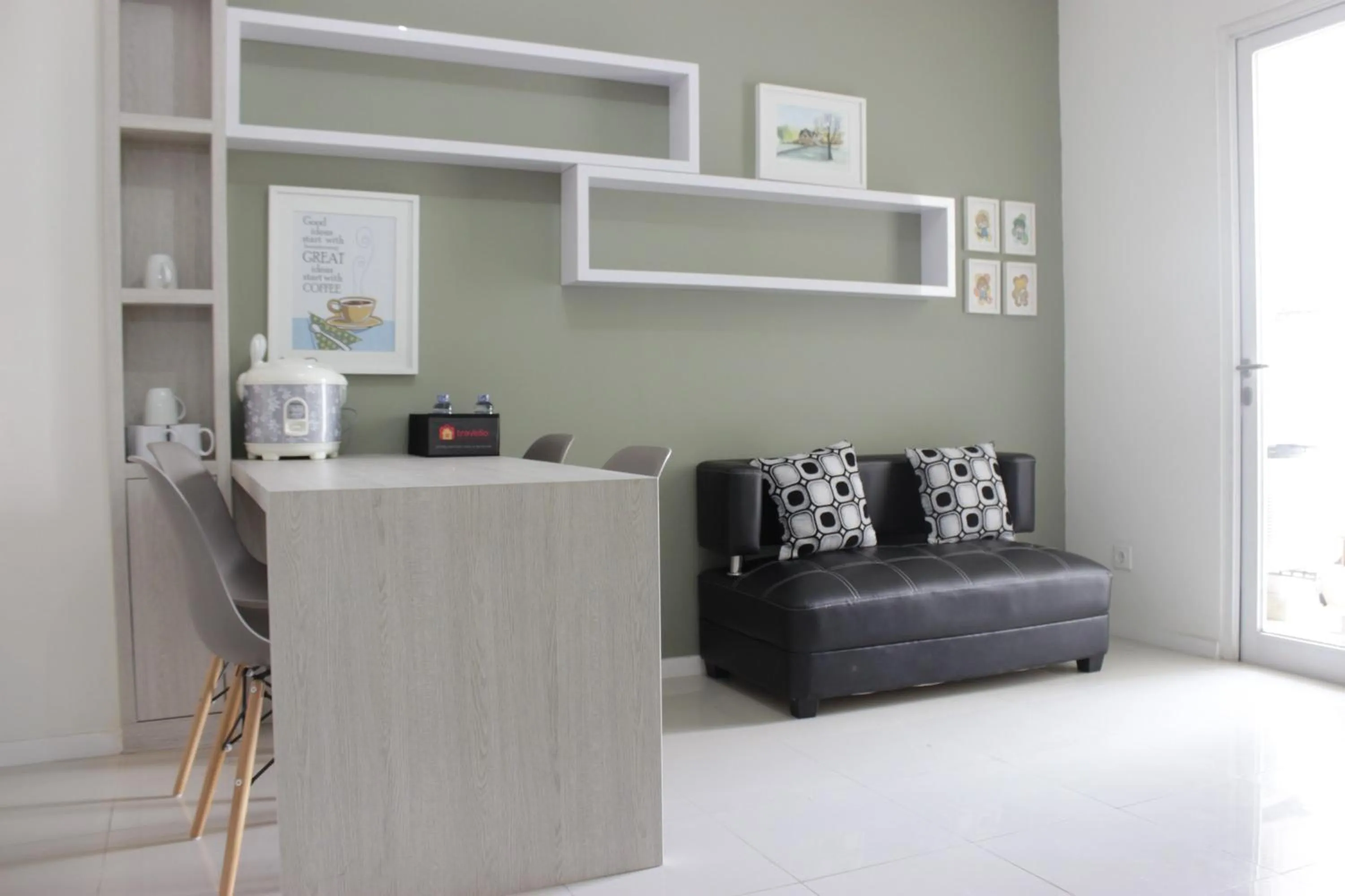 Living room in Spacious 3BR Apartment Parahyangan Residence near UNPAR By Travelio