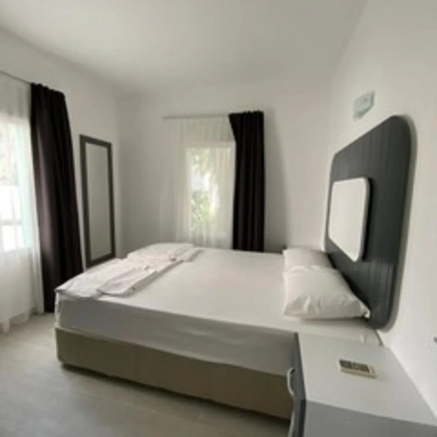 Bed in Manolya Hotel