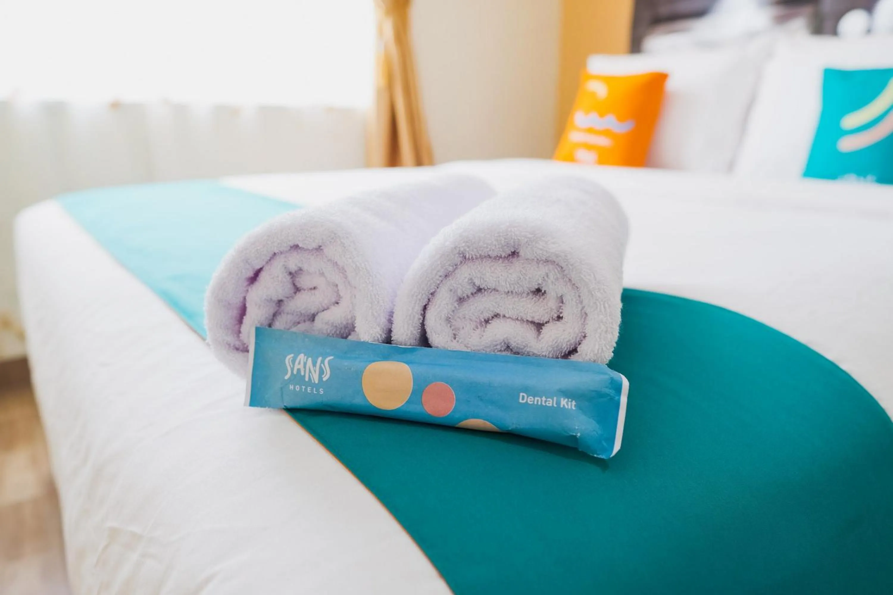 Bedroom, Bed in Sans Hotel Cemara Asri Medan