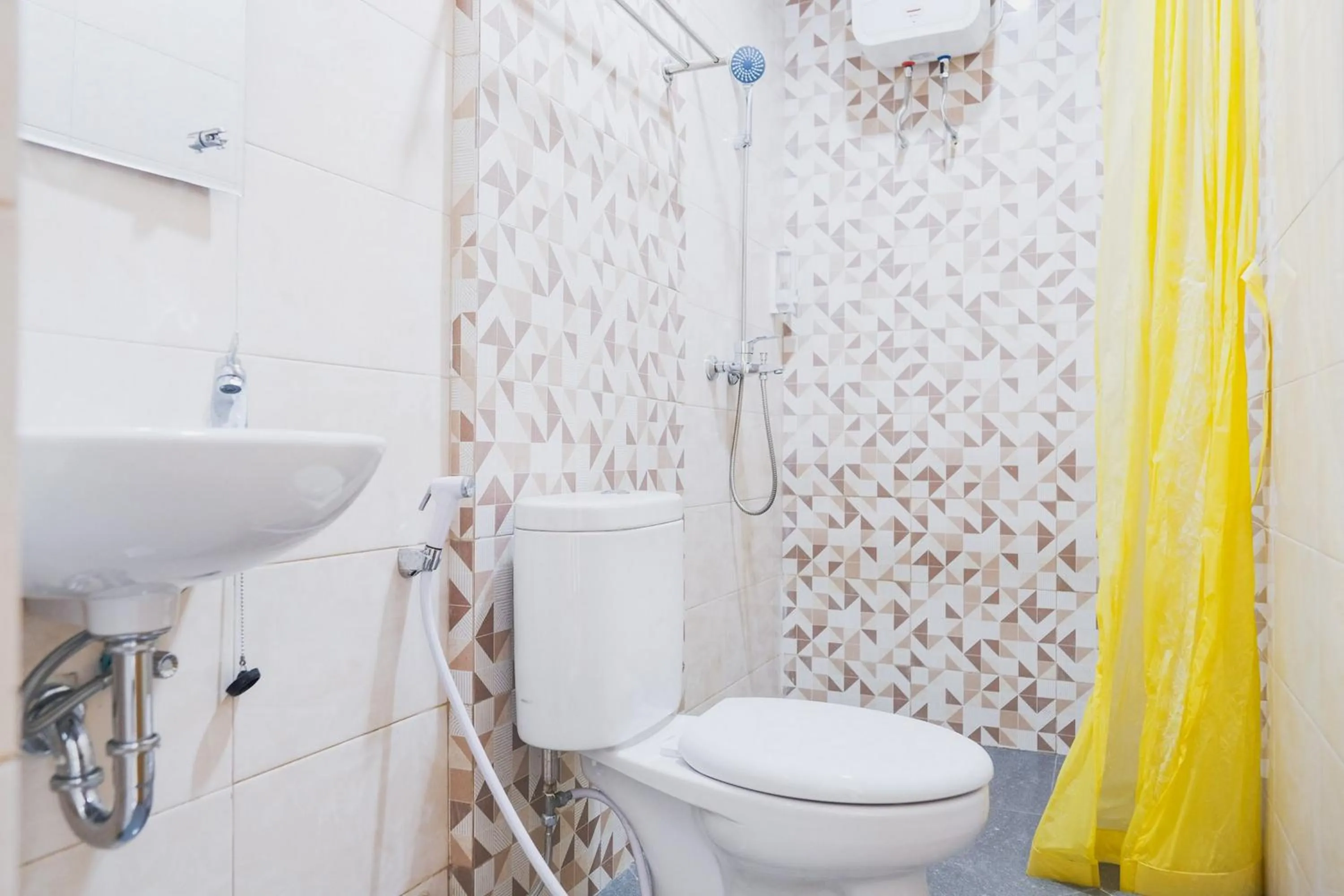 Bathroom in Sans Hotel Cemara Asri Medan