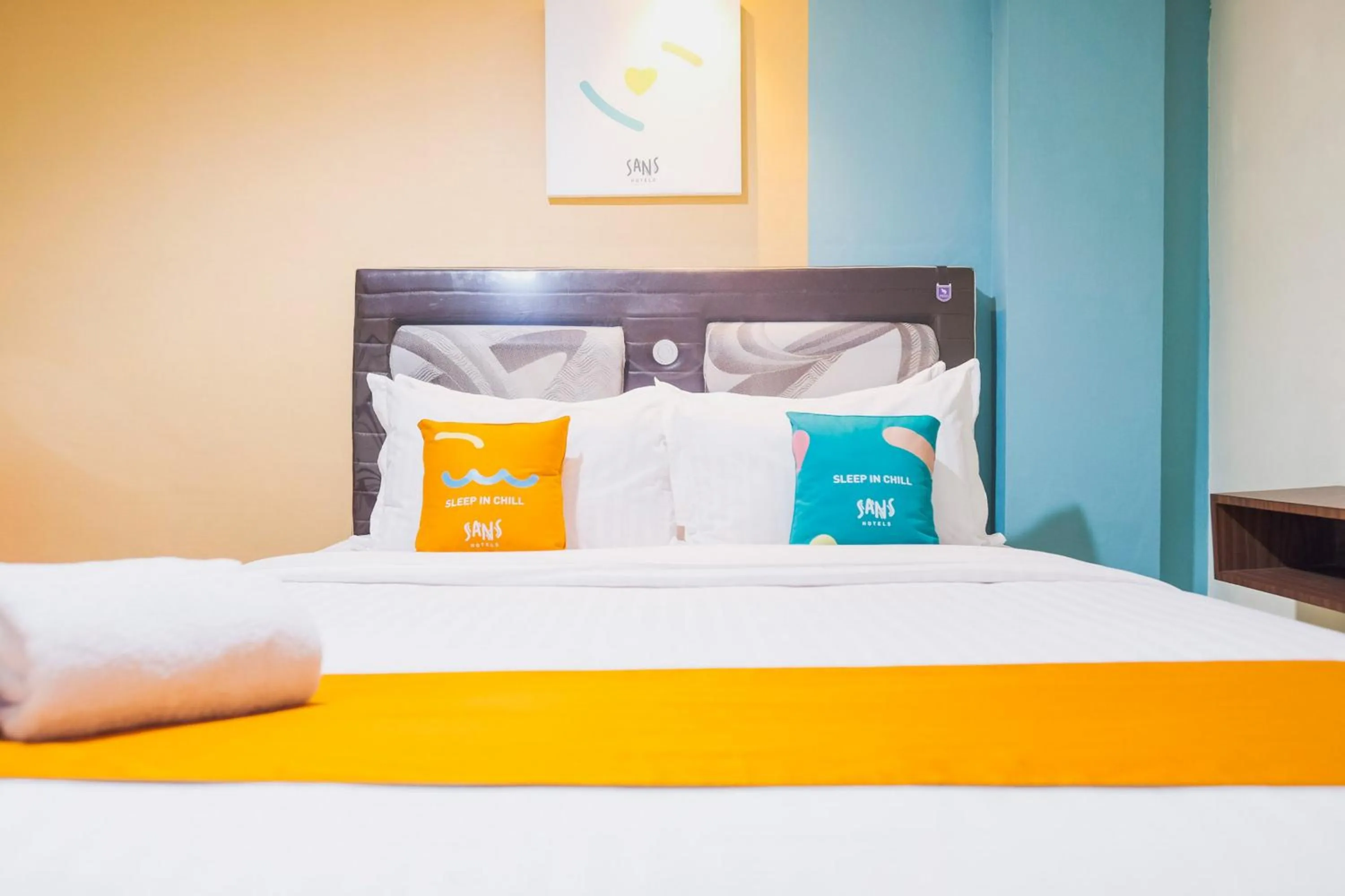 Bedroom, Bed in Sans Hotel Cemara Asri Medan