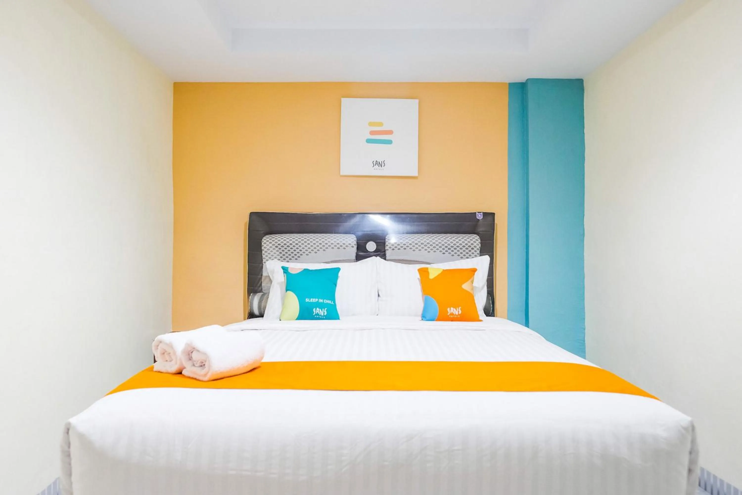 Bedroom, Bed in Sans Hotel Cemara Asri Medan