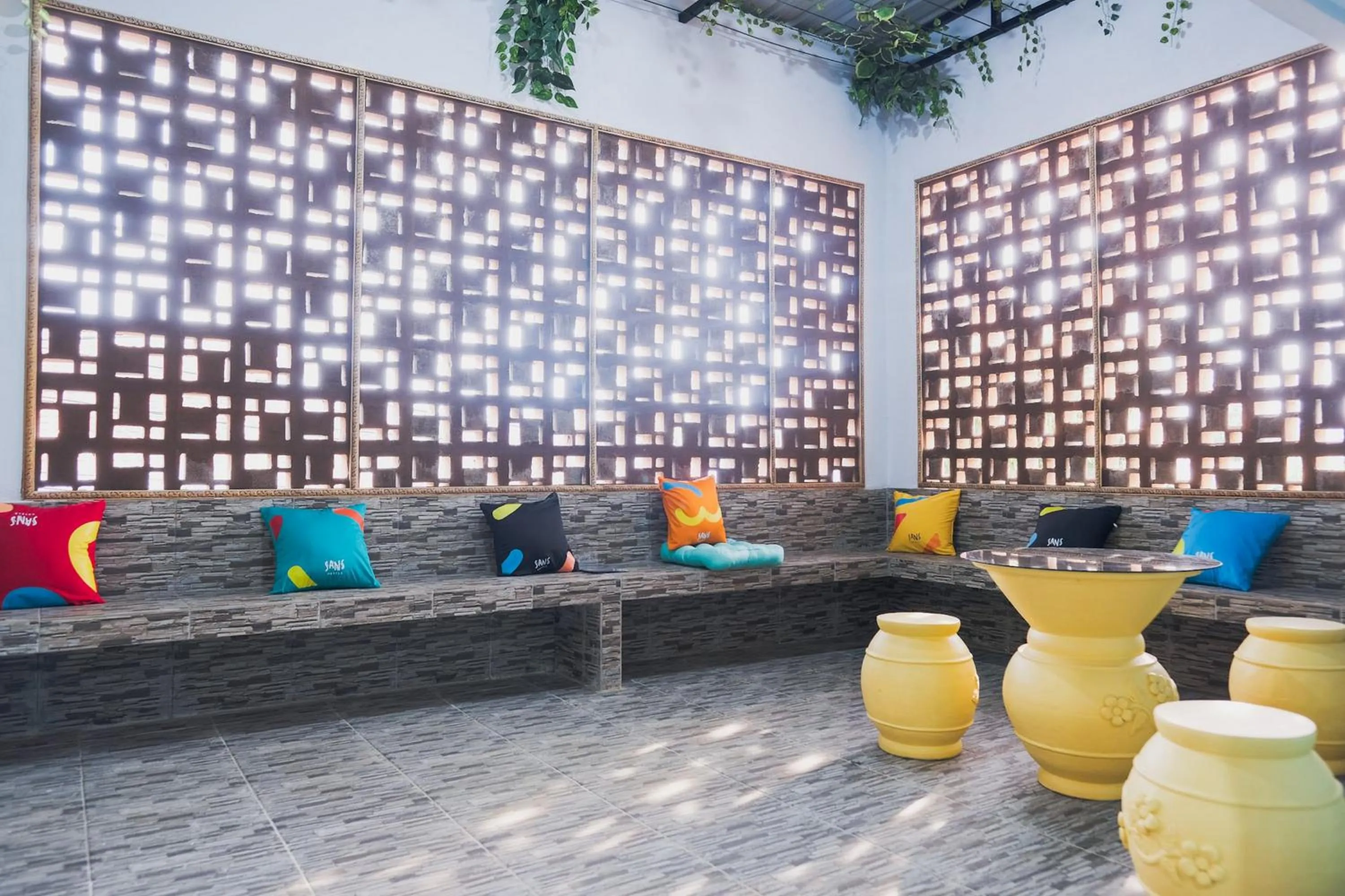 Seating area in Sans Hotel Cemara Asri Medan