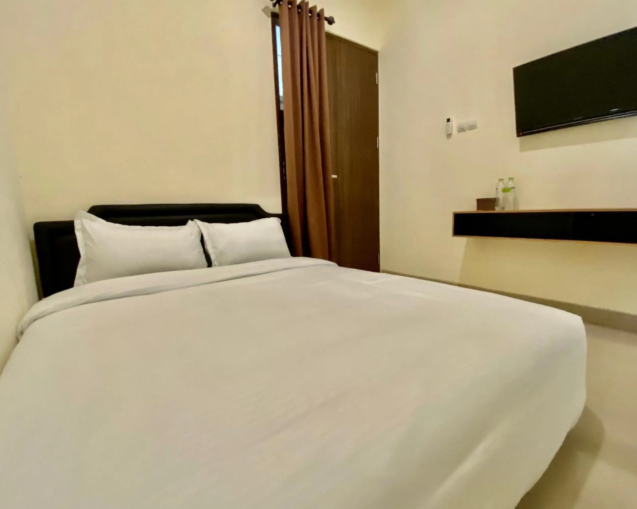 Bed in RedDoorz at Arkana Seturan Pakuwon Mall