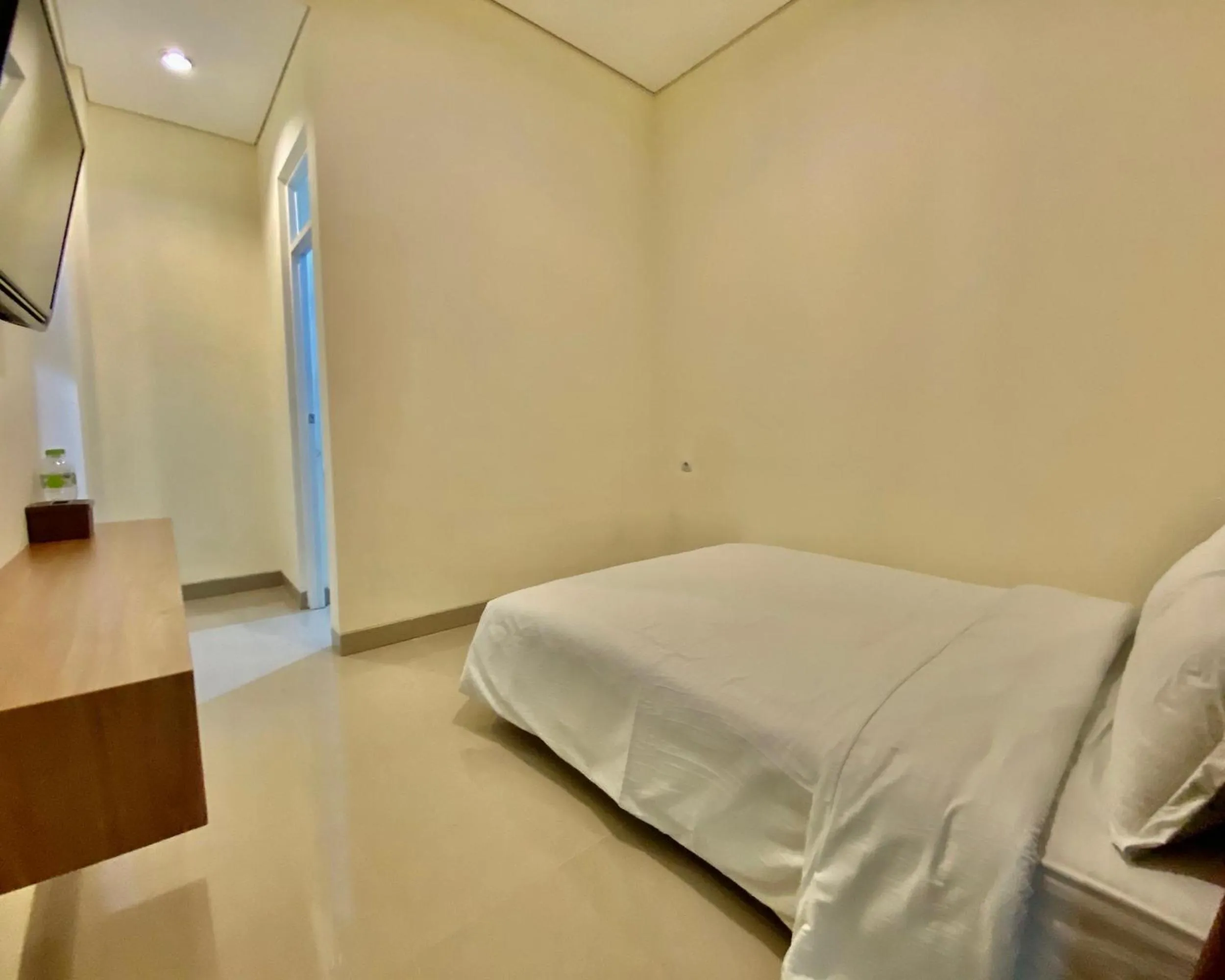Bed in RedDoorz at Arkana Seturan Pakuwon Mall