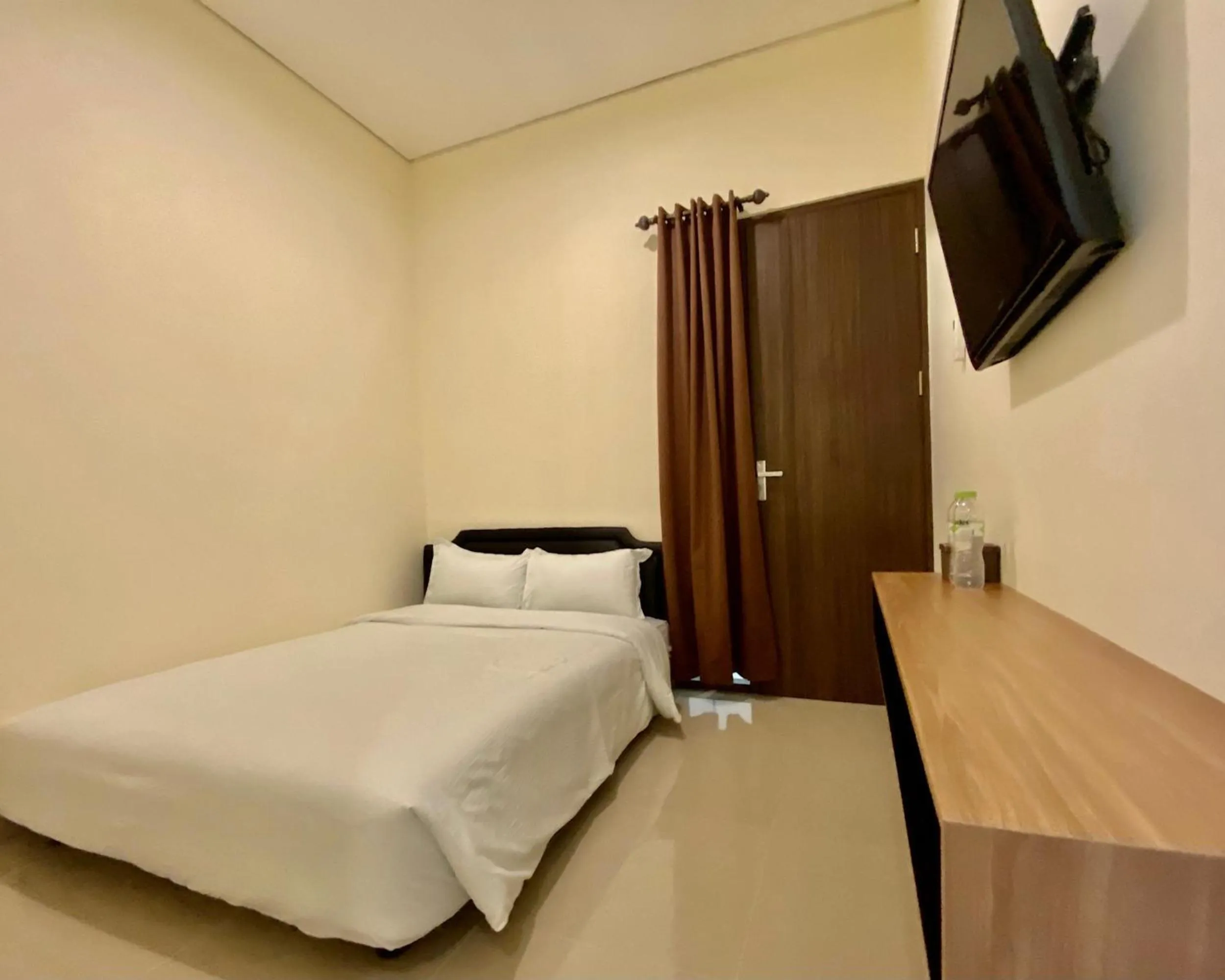 Bed in RedDoorz at Arkana Seturan Pakuwon Mall