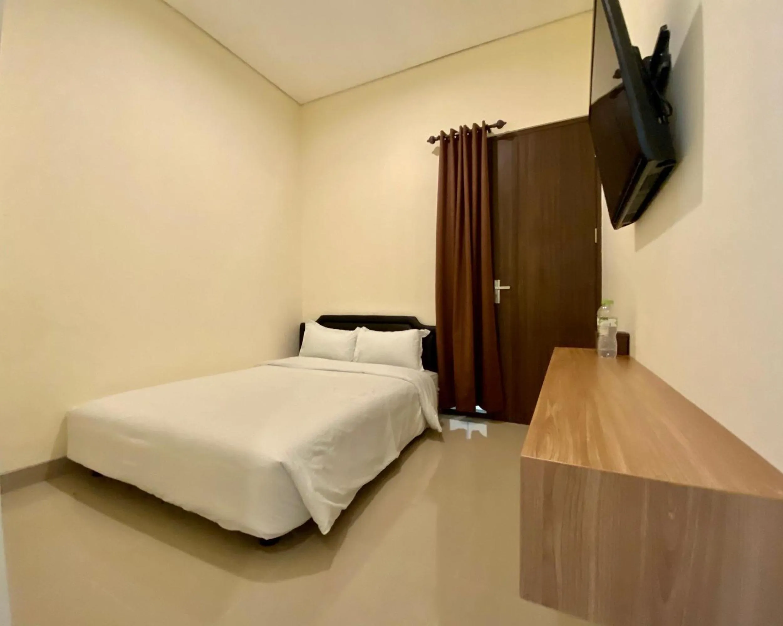 Bed in RedDoorz at Arkana Seturan Pakuwon Mall