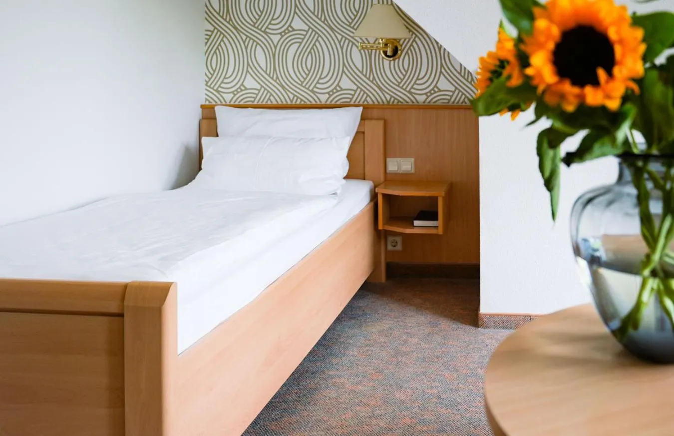 Bed in Hotel Marschall Duroc