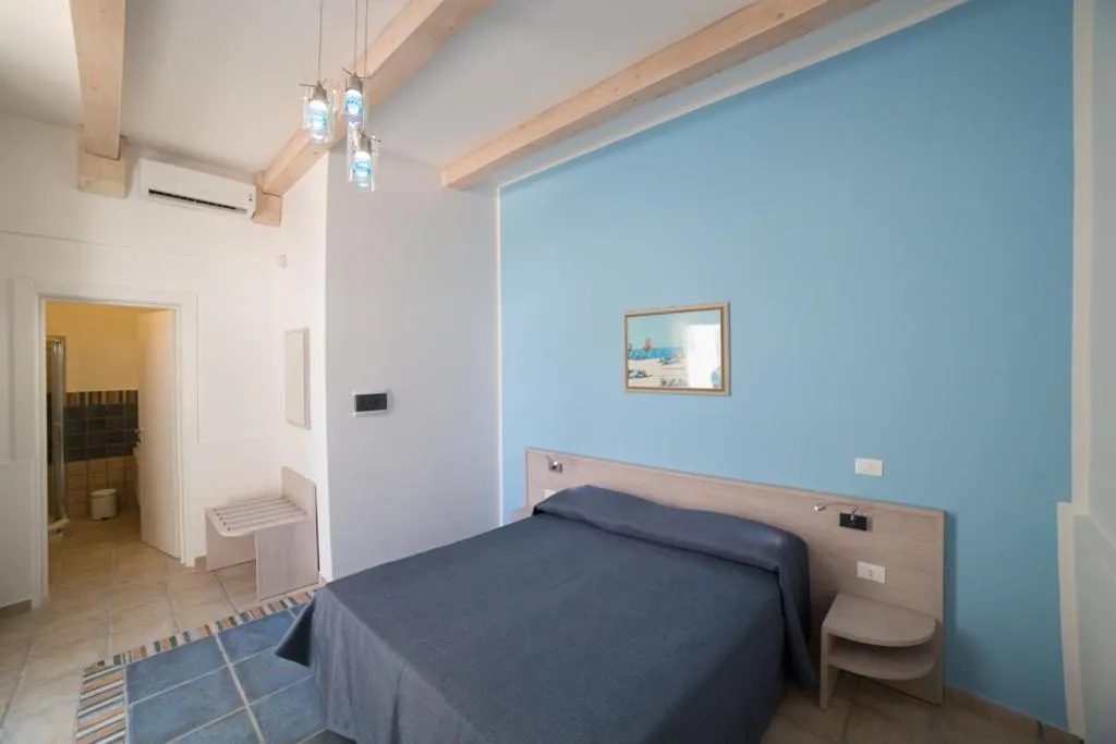 Bed in La Giara Resort