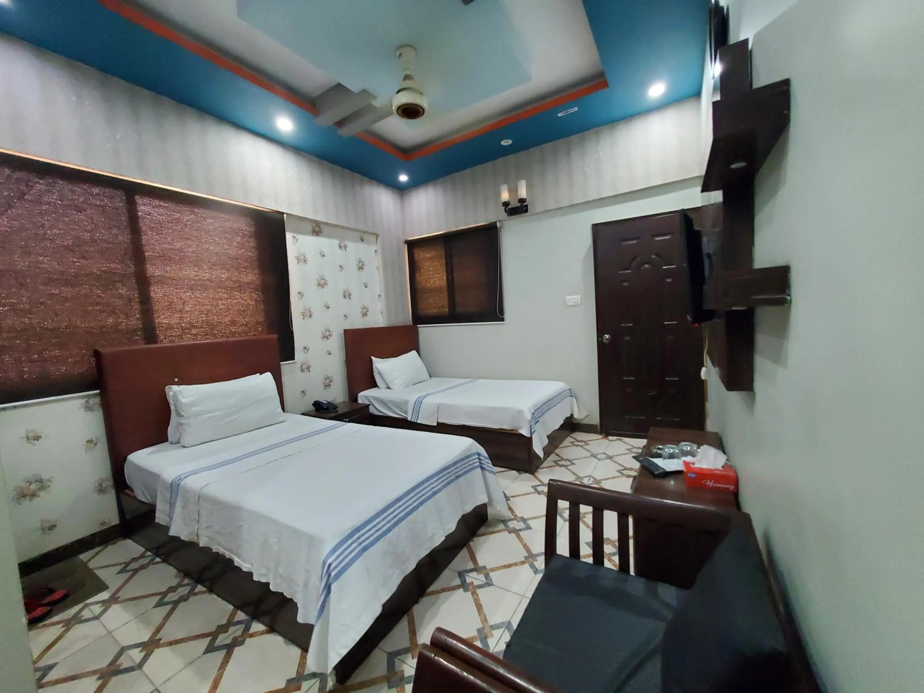 Bed in Diplomat Inn Hotel