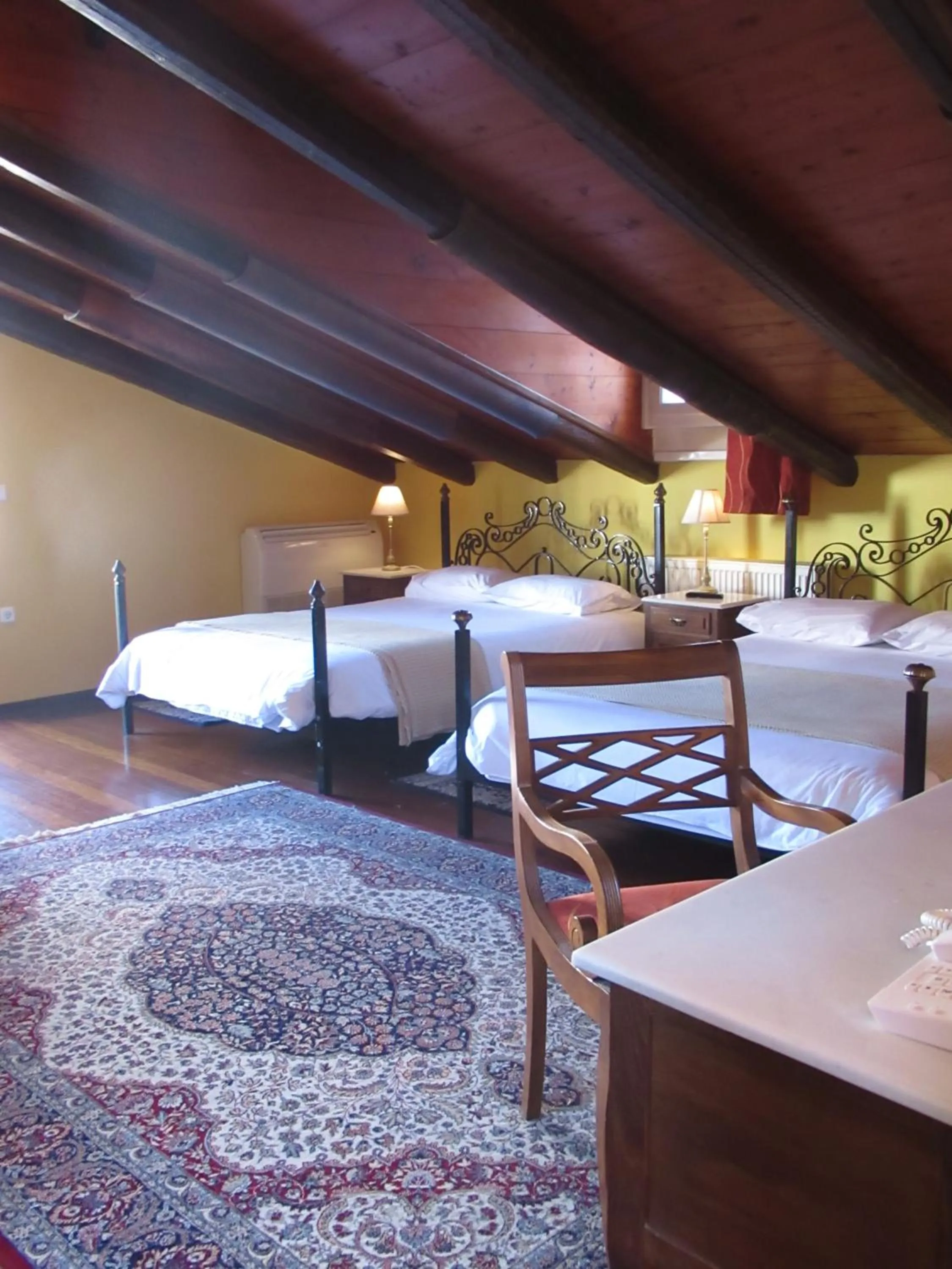 Bed in Byron Traditional Hotel