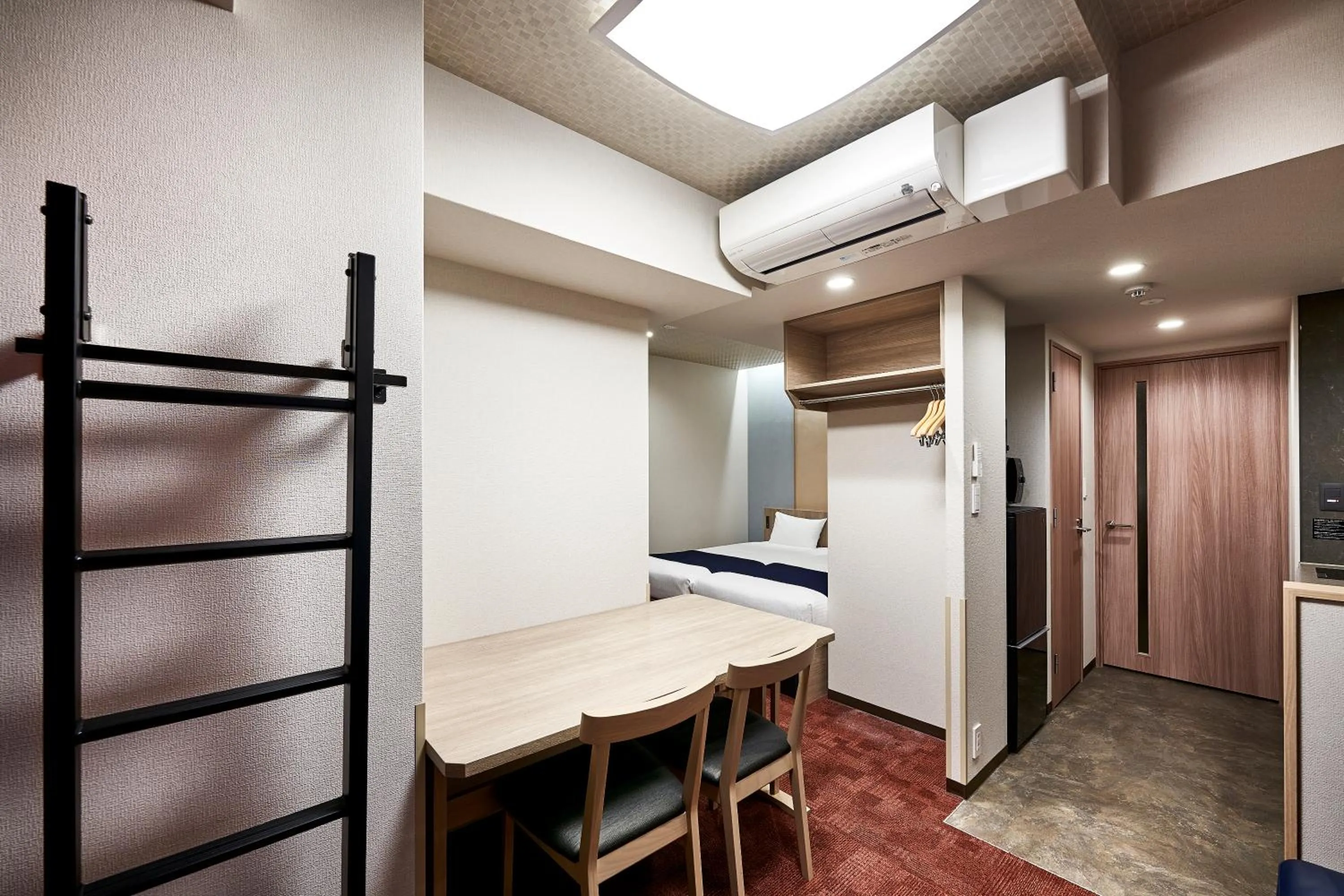 Bed in MONday Apart Premium KYOTO Station