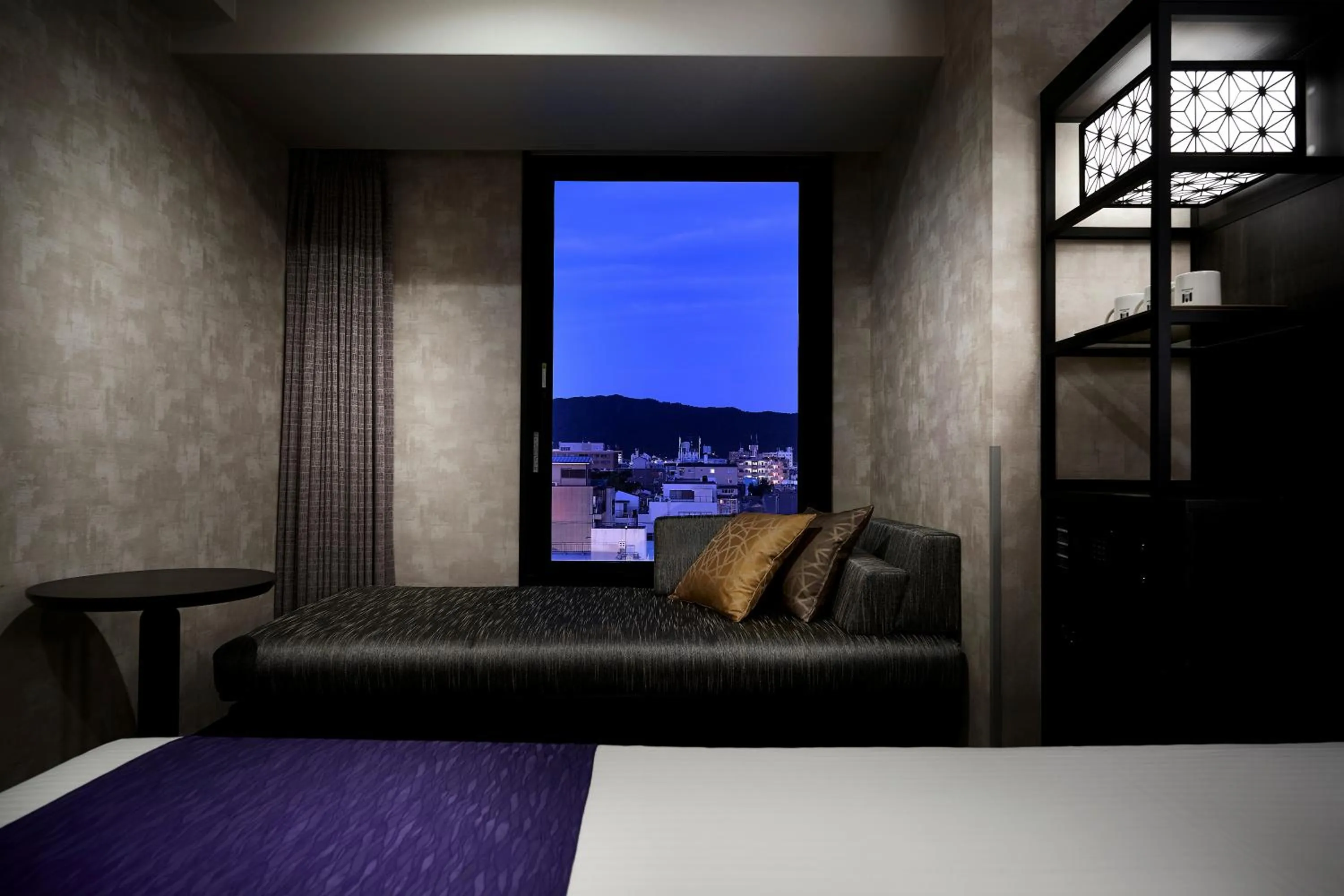 Bed in hotel MONday KYOTO MARUTAMACHI