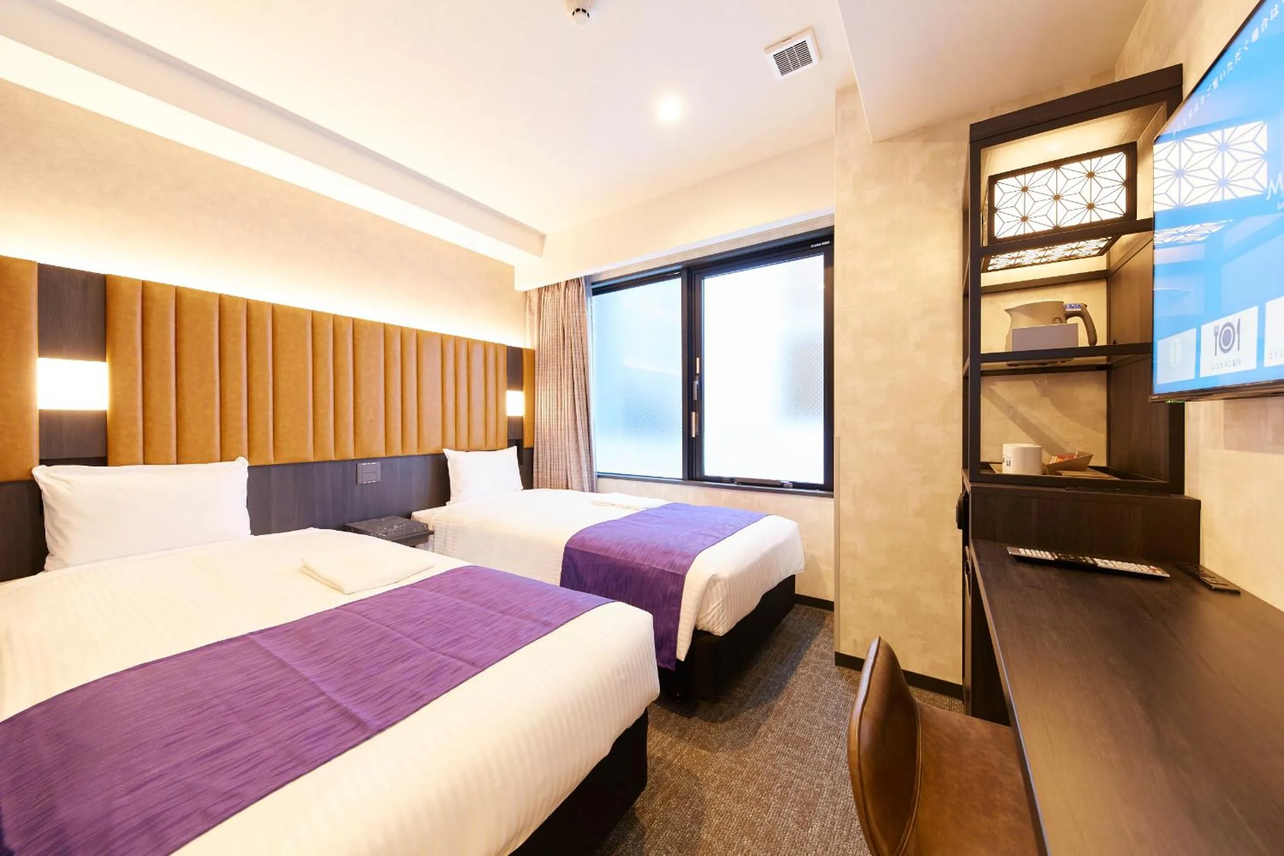 Bed in hotel MONday KYOTO MARUTAMACHI