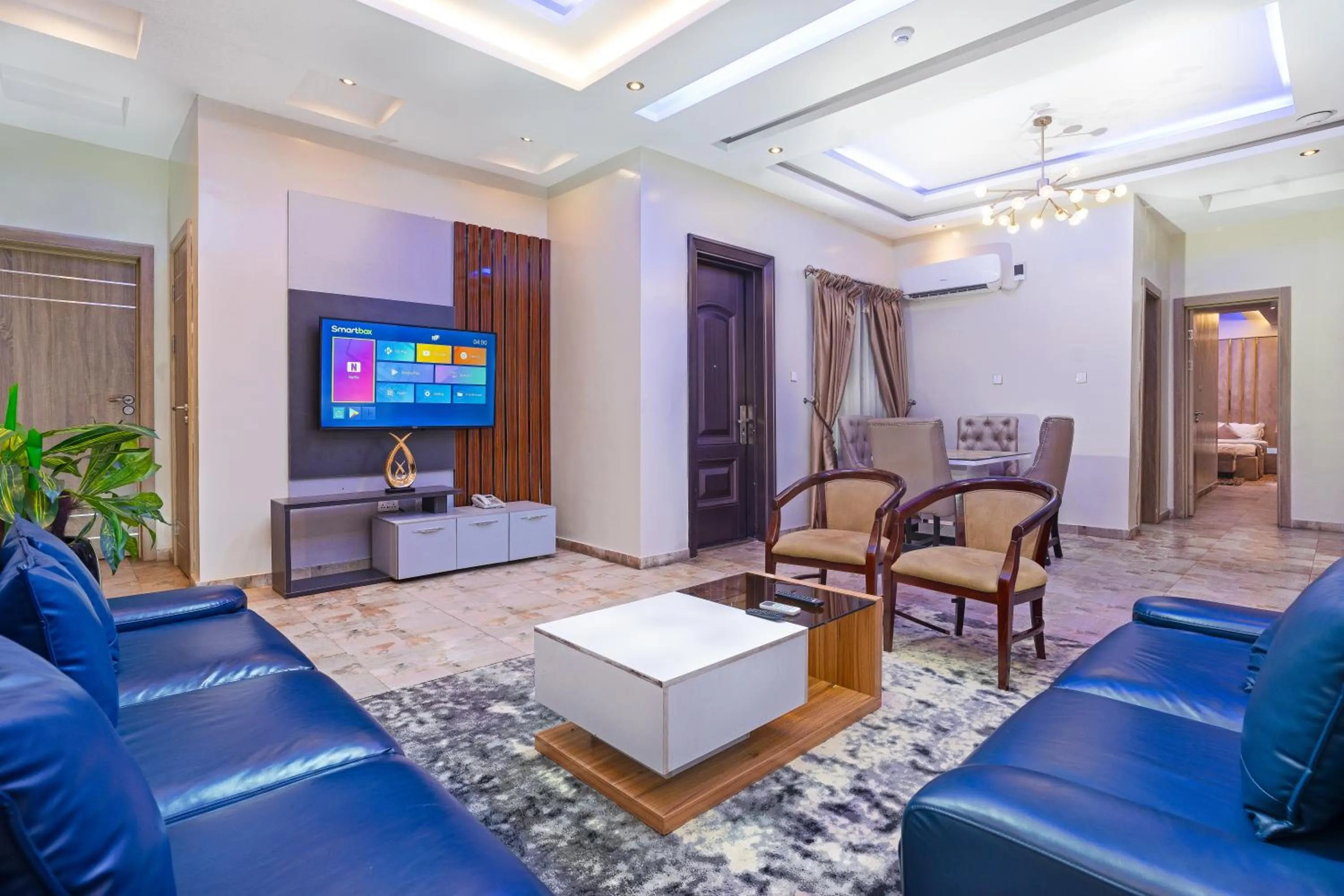 Living room in God's Touch Apartments Signature