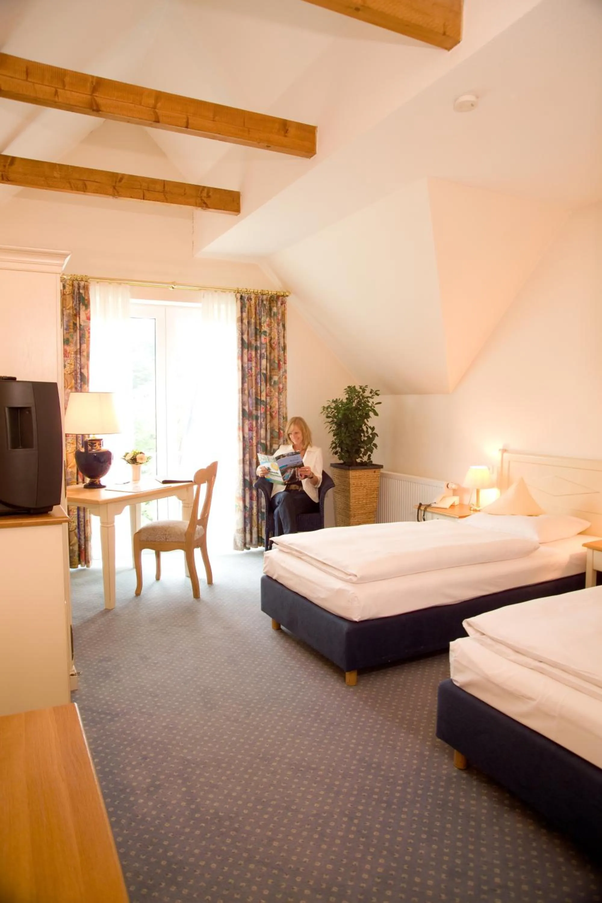 Photo of the whole room, Bed in Hotel & Apartments Leugermann