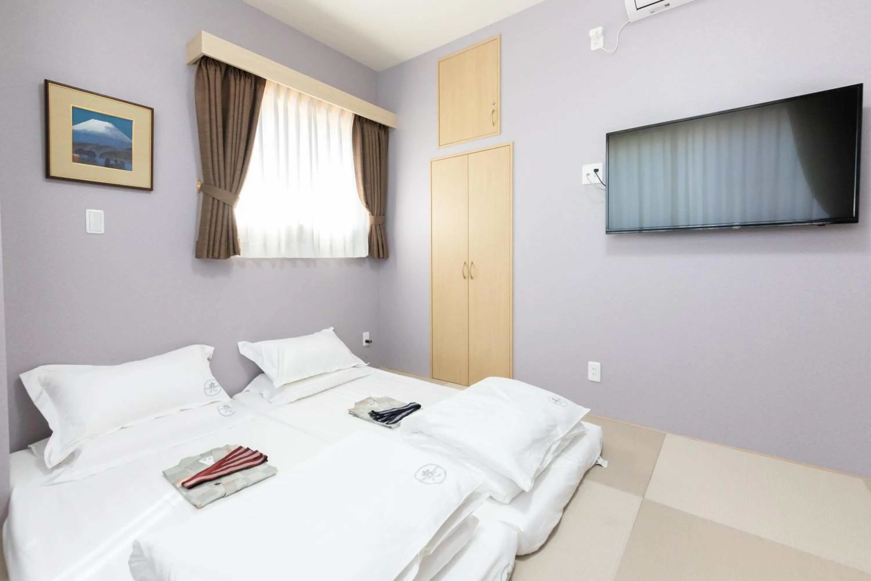 Bed in 灯光旅館 Light hotel