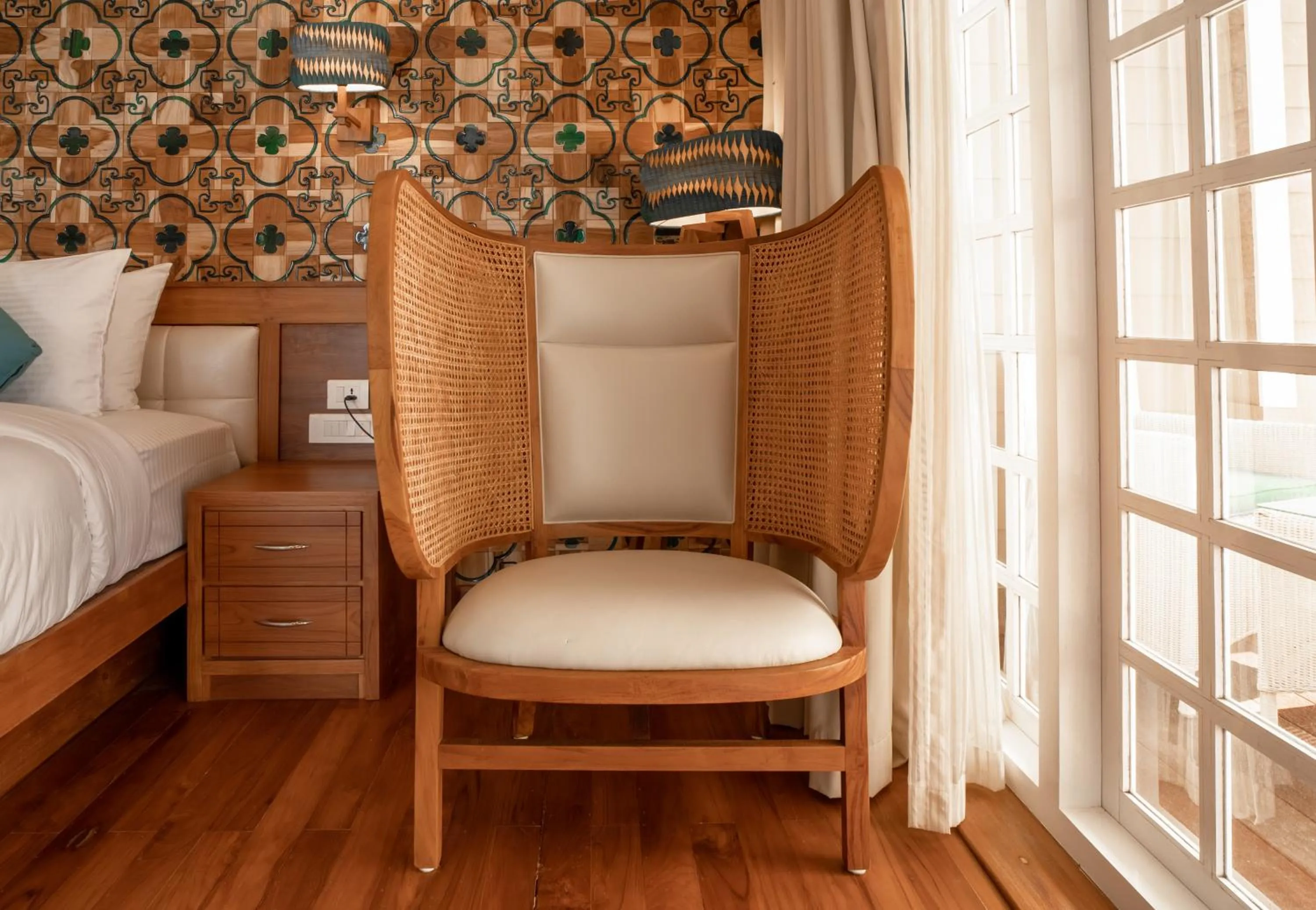 Seating area, Bed in State Beach Resort And Spa