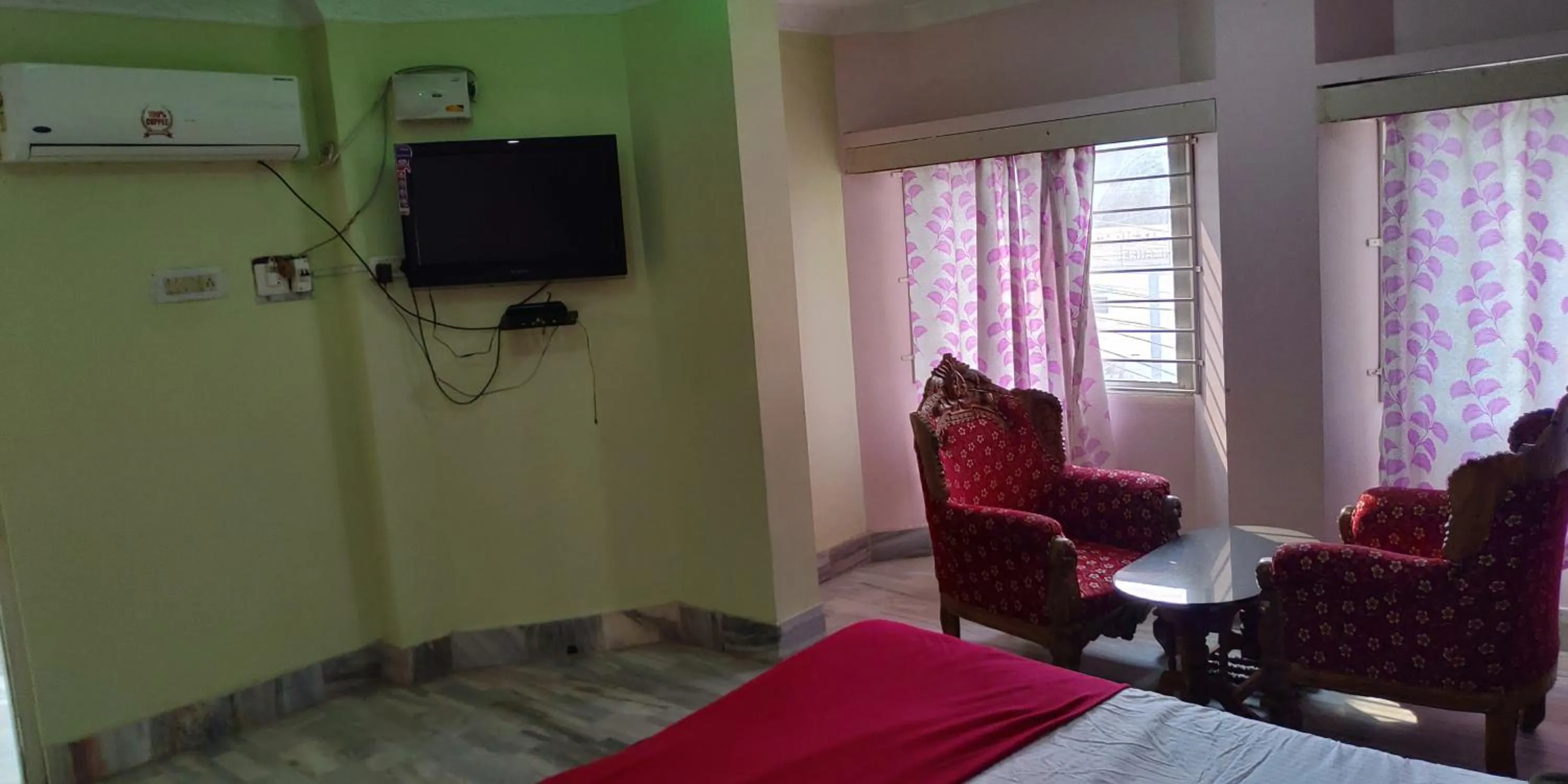 Photo of the whole room, Bed in Hotel HCB (Hemo Chandra Bhawan)