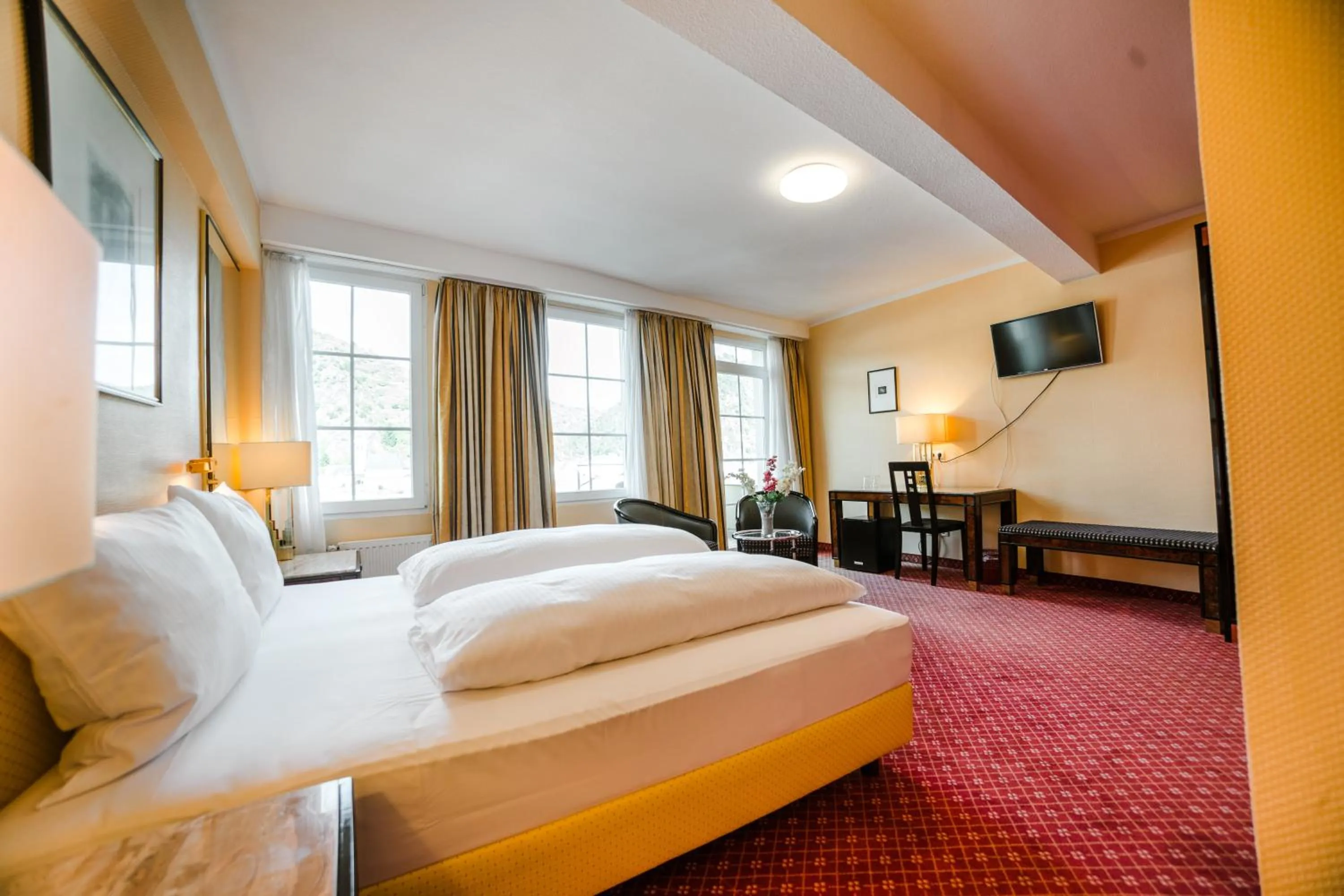 Photo of the whole room, Bed in Hotel Rheinfels