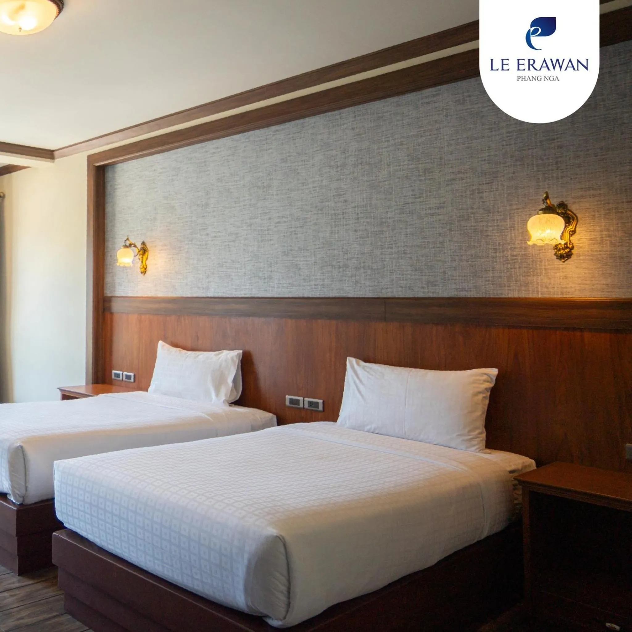Bed in Le Erawan Phang Nga Hotel