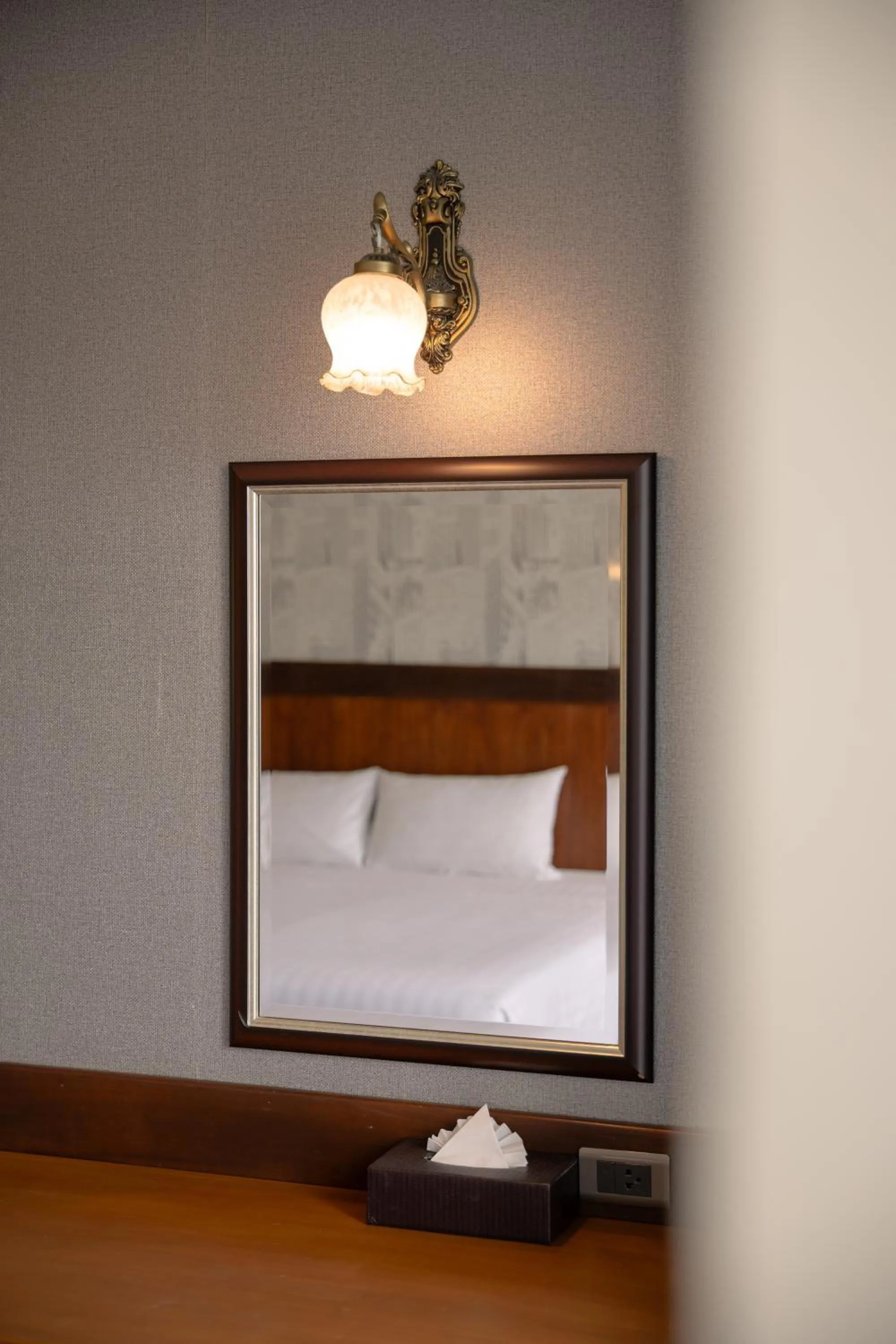 Bed in Le Erawan Phang Nga Hotel