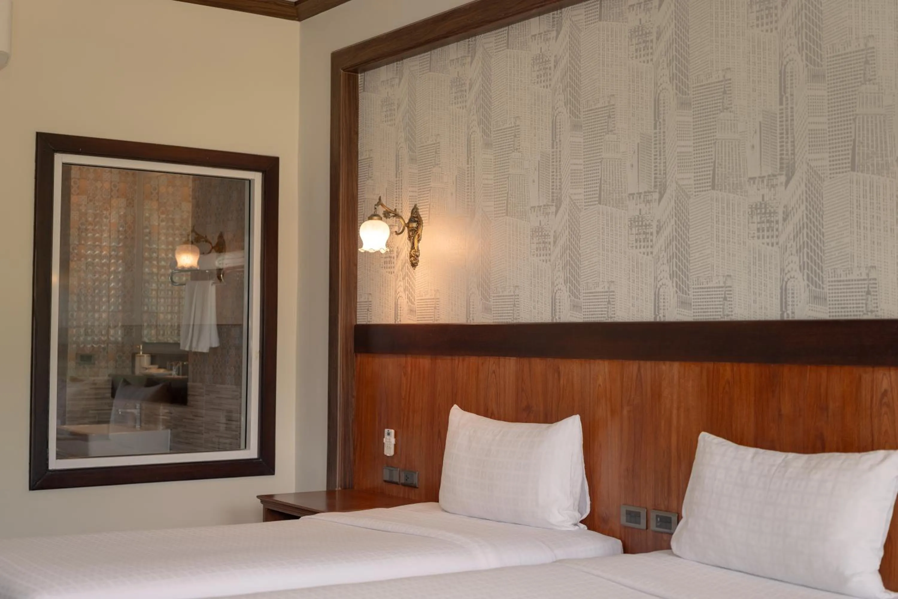 Bed in Le Erawan Phang Nga Hotel