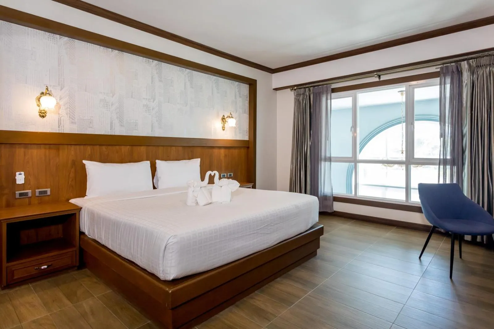 Bed in Le Erawan Phang Nga Hotel