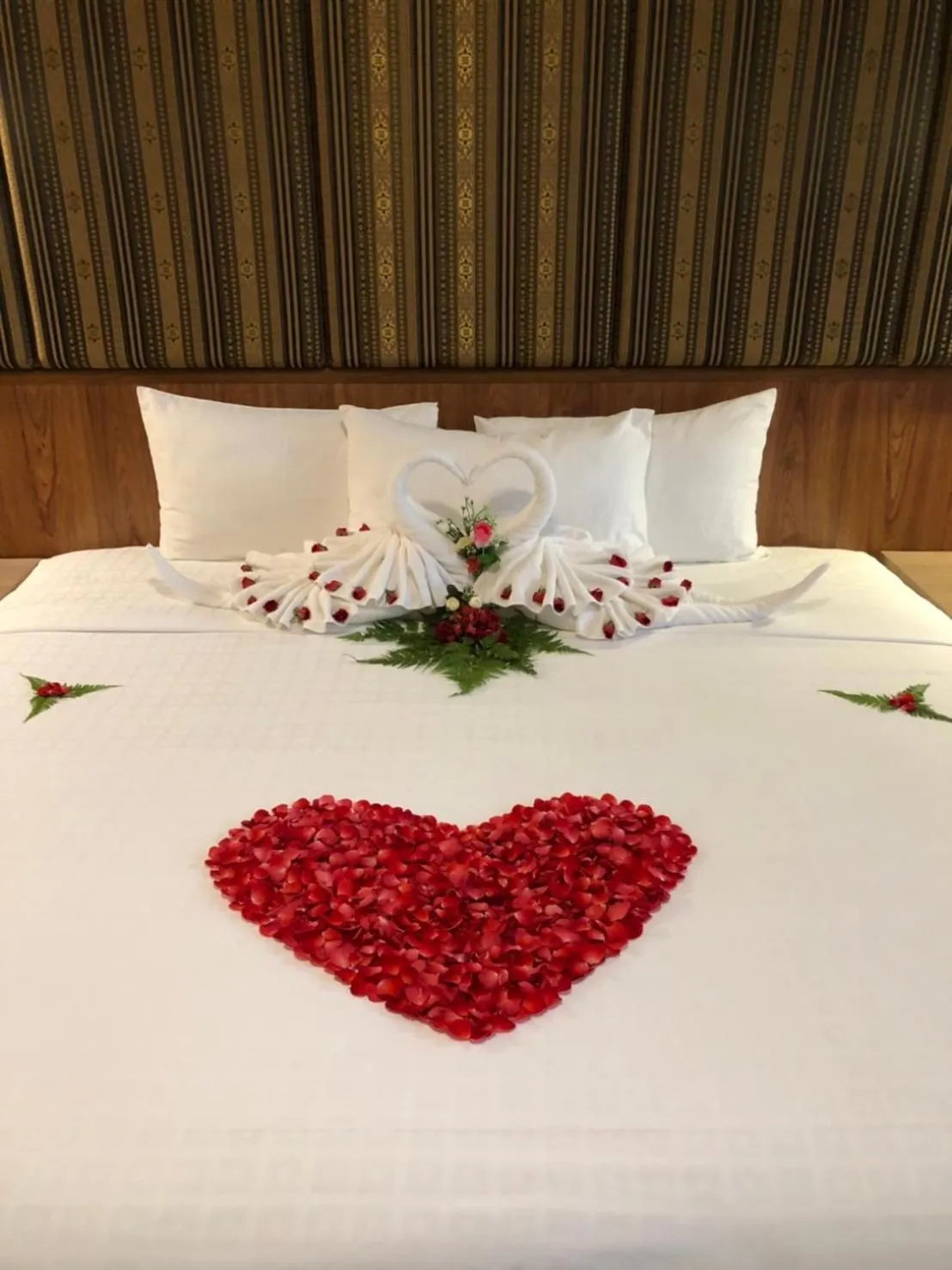 Bed in Le Erawan Phang Nga Hotel